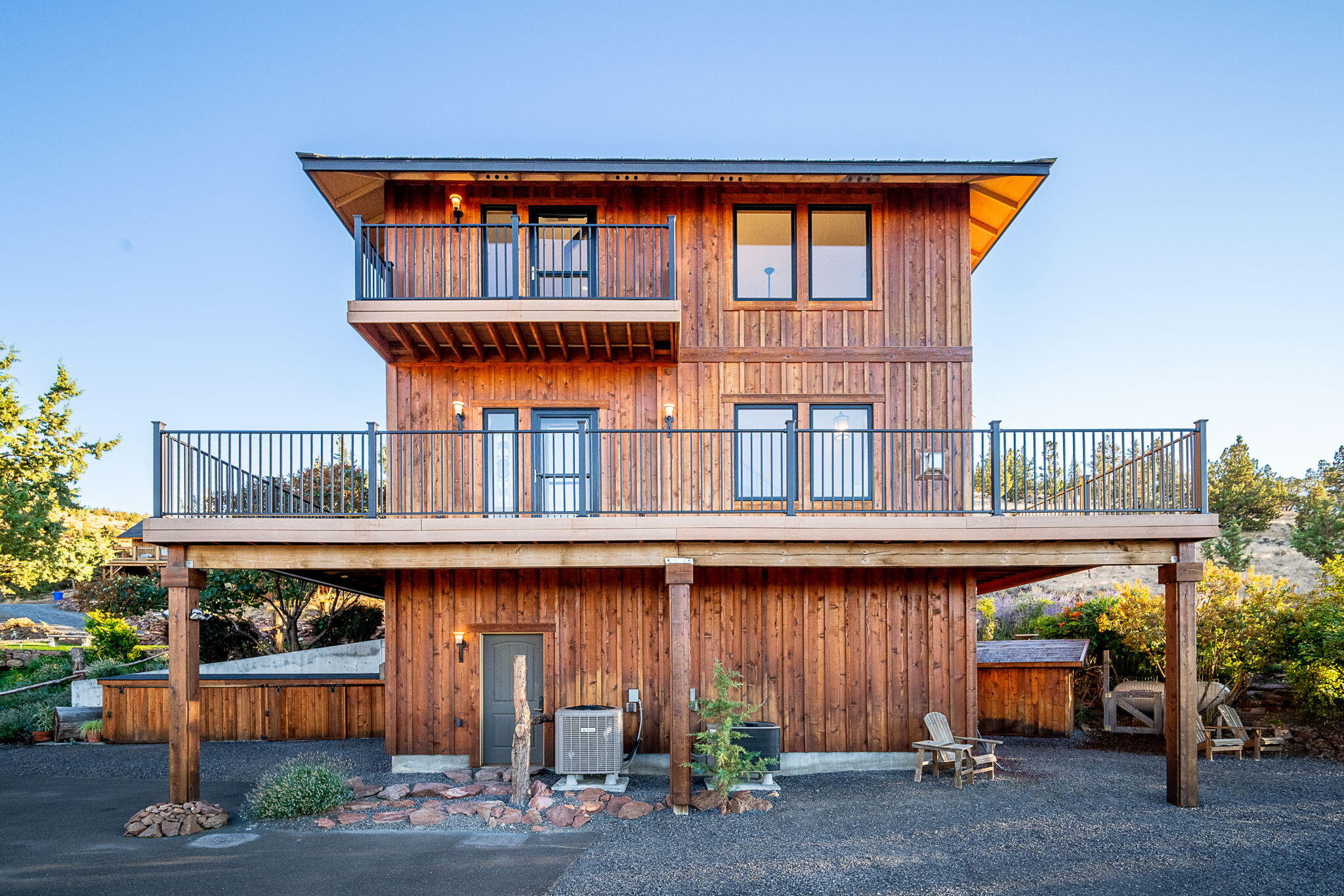 Discover a one-of-a-kind Central Oregon retreat where breathtaking Cascade views, unmatched privacy, & endless adventure meet—perfect as a vacation getaway, peaceful primary residence, or outdoor getaway.  Nestled on 5.04 private acres, this 1,910 sq. ft. custom-built home offers 3 bedrooms, 3 baths, & timeless craftsmanship. Expansive Mill Guard windows and a 360° wrap-around deck frame sunsets over Mt. Jefferson, Hood, Black Butte, Broken Top, and even St. Helens. Adjoining 2,381+ acres of National Grasslands with access to BLM land, the property is ideal for hunting, hiking, horseback riding.  Inside, enjoy hardwood floors, custom woodwork, stainless counters, propane range, and a versatile loft. Outside features include trimmed junipers, fertile soil, a dry sunny climate, and private paved access. Minutes to Haystack Reservoir, Lake Billy Chinook, Smith Rock, Culver, Redmond Airport, and just 45 minutes to Bend. A rare chance to own serenity, recreation, and views that never end.