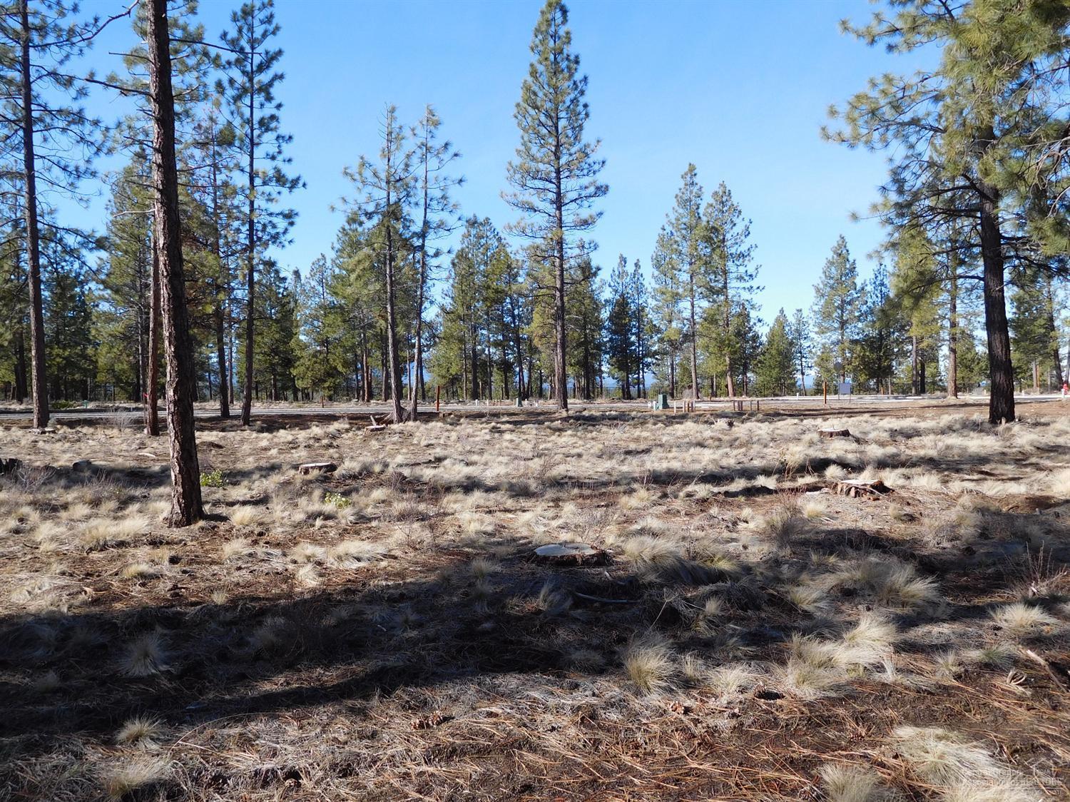 Three Pines Ridge, Bends newest NW premier community consisting of flat homesites that sit just at the edge of the UGB. Build your dream home surrounded with large ponderosa pine trees, peek-a-boo mountain views from this lot, higher end quality construction and upscale homes nearby. Enjoy the easy access to Shevlin Park trail system for hiking, biking & running. Come visit Three Pines Ridge to really capture the feeling of Bends newest neighborhood.