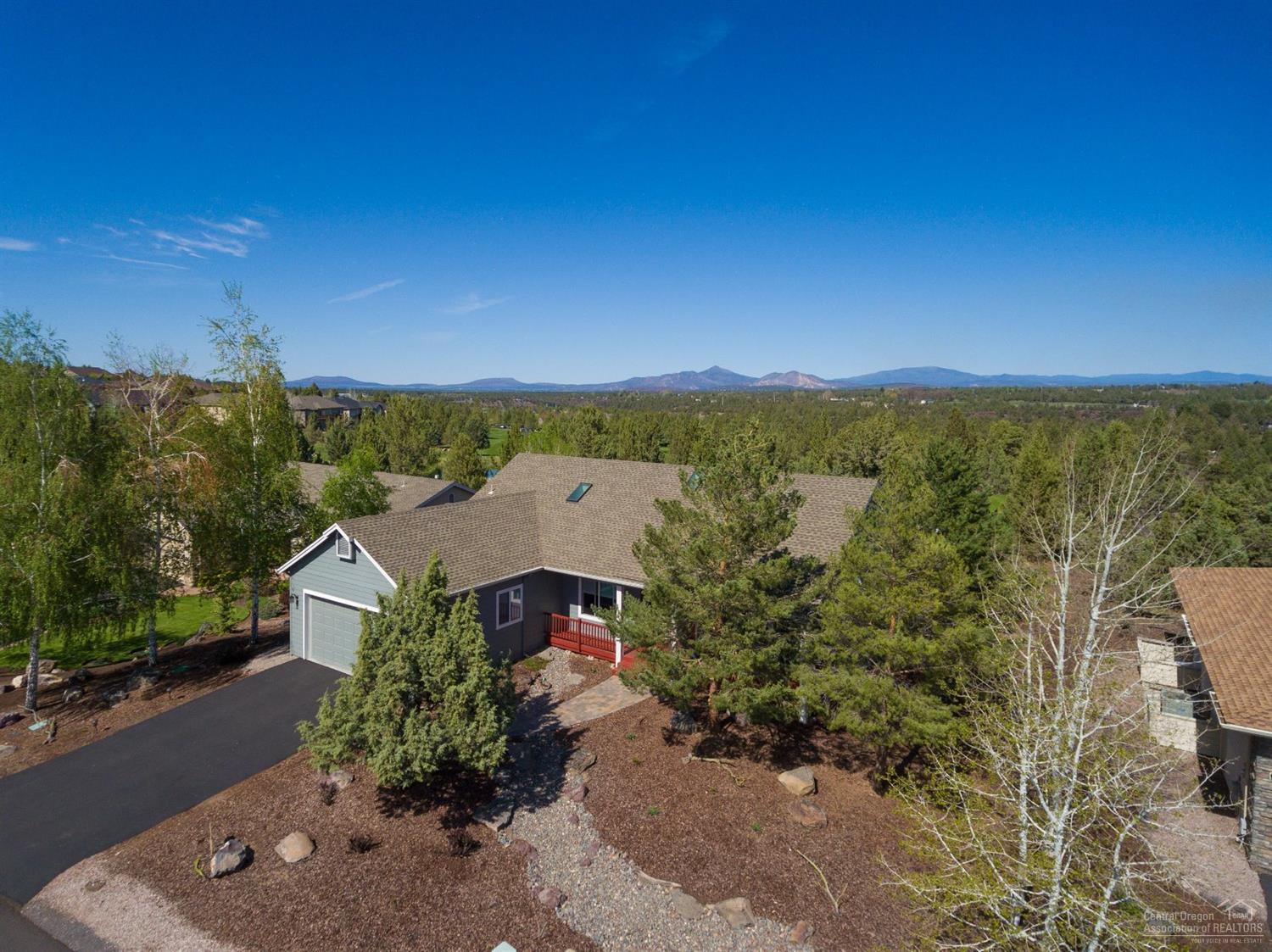 Nicer than new single level home in the premiere 55+ community, The Falls at Eagle Crest. It is nicely situated just behind the 14th tee of the Challenge Course at Eagle Crest. The kitchen was recently remodeled w/custom cabinetry, countertops, & stainless appliances. Both baths feature new cabinetry & full tile walk in showers w/tastefully chosen finishes. The living space has hardwood & tile flooring w/ Central Vac. The back yard is an oasis w/deck & built in planters/benches & an expansive pergola.
