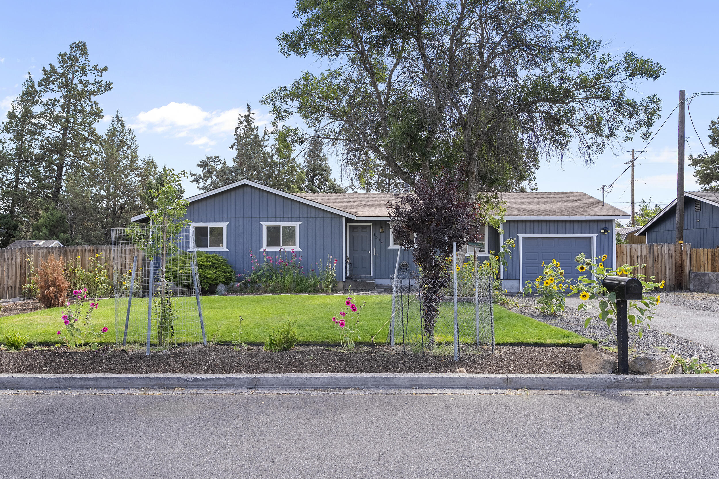 Need extra parking or room for your toys with room for kids to enjoy playing outside safely? Do you enjoy grilling and like to intertain friends and familly no matter the weather? Well you can do so under a big covered back patio here. Come take a look at this oversize lot measuring .27 of an acre (11,761sqft). Very quiet and friendly neighborhood on a dead end street. Easy access to HWY 97 and to all of the SW amenities Redmond has to offer like Lowes, Fred Meyers, Theater, banking, shopping and restaurants. Home has new floors and will come with all the appliances including washer/dryer and refrigerator. Home has a Mini Split unit in the living room.