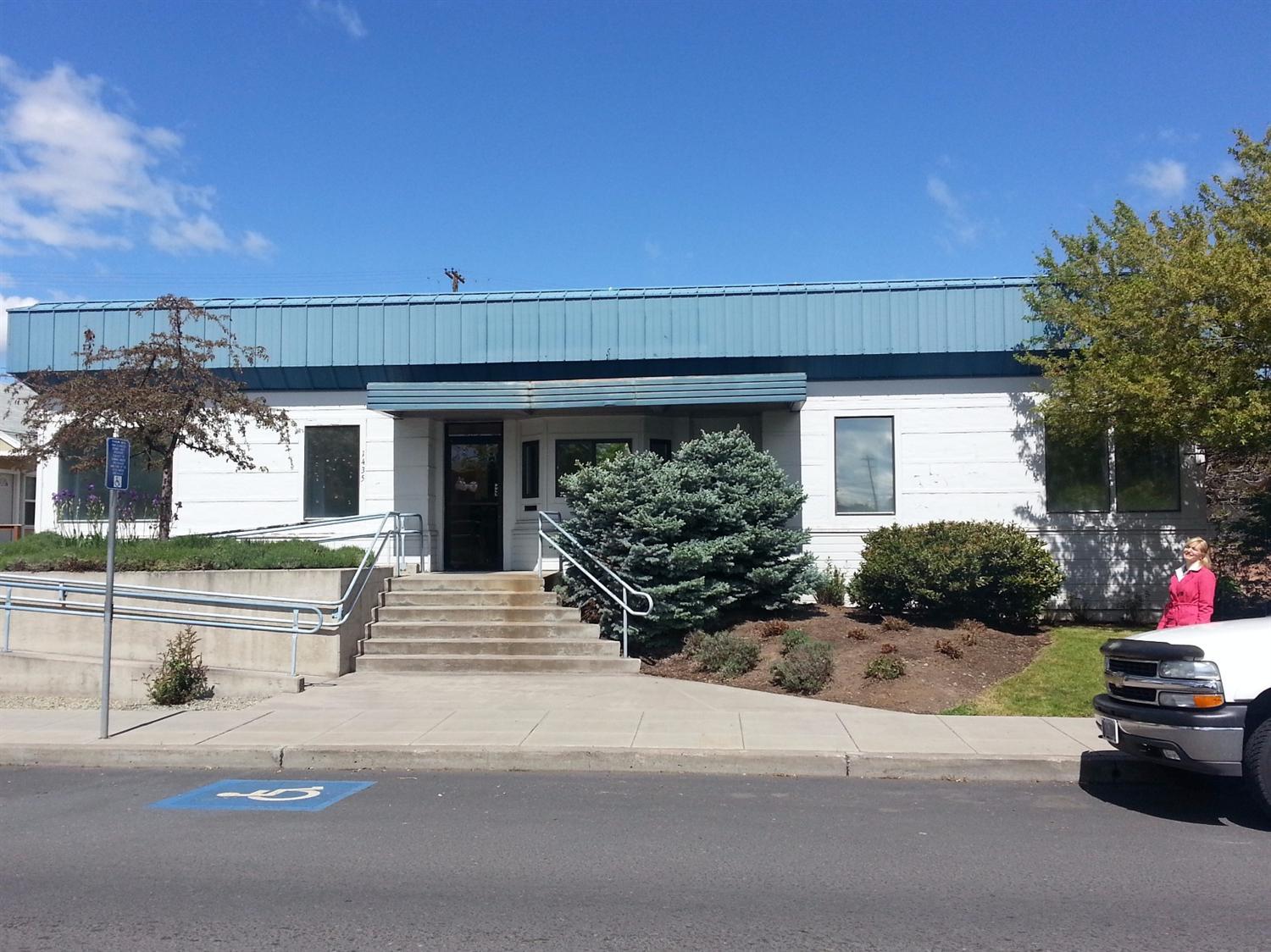 Commercial building in downtown Klamath Falls and within a short distance to Sky Lakes Medical Center and Oregon Tech. Three spaces in the building. Property includes the parking lot on the NW side of the building in addition to parking behind the building. Middle space is occupied by NIS Research Labs. SW side is vacant and last occupied by West Home health with 13 individuall offices, reception area, storage rooms and break room. NE third was previously utilized as the Merle West Center for Research and consist of private office, conference room, kitchenette, large storage room and back warehouse space with large doors to back alley, NFA letter on file from DEQ.