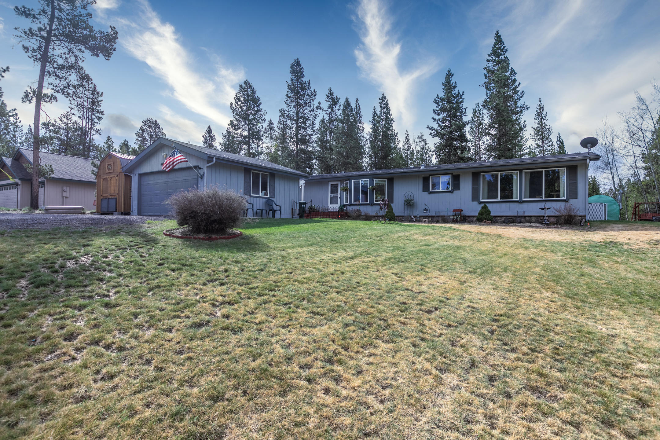 Peace & beauty nestled into the pines just outside of Bend. River  trail out your backdoor!  1,536 sqft,3 Bed,2 Bath home is situated on a clear .51 acre corner lot. Fenced backyard,large front lawn, landscaped with sprinkler system/timer, & spacious decks being freshly restained.The charming home with detached garage has been well kept with recent updates.New wood floors throughout main living space and Master, Quartz countertops in kitchen,a pellet stove for those chilly winter nights and abundant windows to bring the scenery of the wilderness in.Split living floorplan with Master and Living Room on one end and 2 Bedrooms, shared Bath and additional Family Room on the other end offer a desirable layout for families.HOA provides private homeowner access to the Deschutes River & a Boat Dock/Marina with waterways all throughout the community.Central Oregon is FULL of recreation, bring your toys and sense of adventure! 6 M. to Sunriver, 22 M. to Bend & 38 M. to Roberts Field Airport