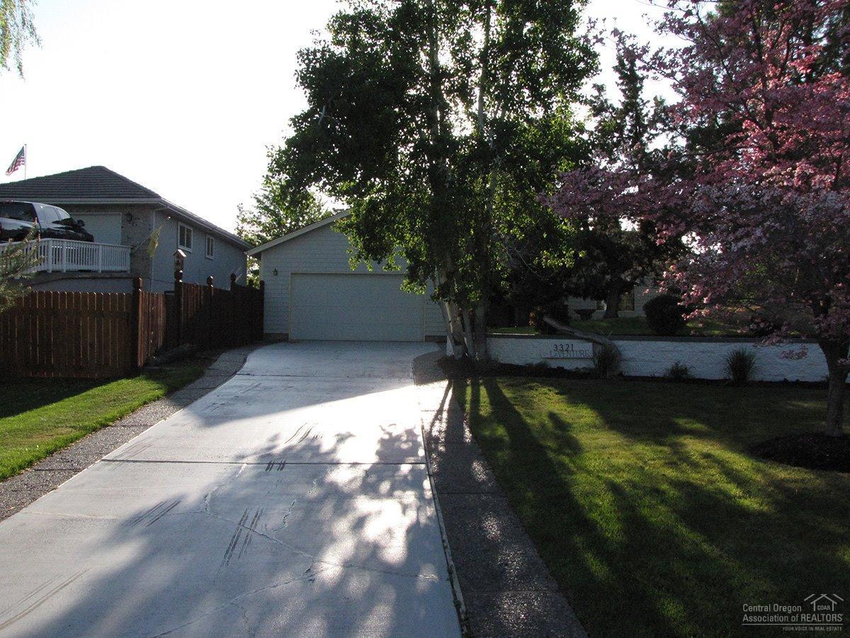 This charming, single level home is located in a serene setting in the middle of the City. Exterior of home and living/dining room painted in 2015. Carpet in living room replaced in 2015. Some of this homes features include black Jenn Aire gas stove/electric oven, Jenn Aire side by side refrigerator, Maytag microhood, Samsung dishwasher, wood floors, vaulted ceilings and much more.