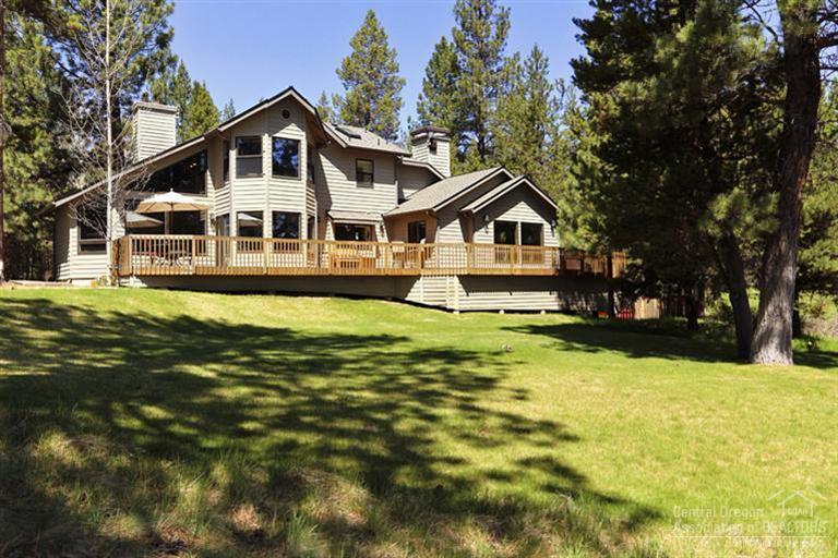 Picture yourself here! Approx. 200' of Deschutes River frontage, private dock offers easy access for kayaking, swimming, fishing & relaxing. Just over 1 acre of privacy & a gorgeous setting. Fabulous home w/high ceilings, open beams, skylights, maple floors, tile floors, open living & dining area w/over sized river rock FP, 2 master suites, main level w/cozy wood stove & access to spa, upper level w/gas fireplace, both w/amazing river views! All appliances, Hot Spring Spa & home warranty included.