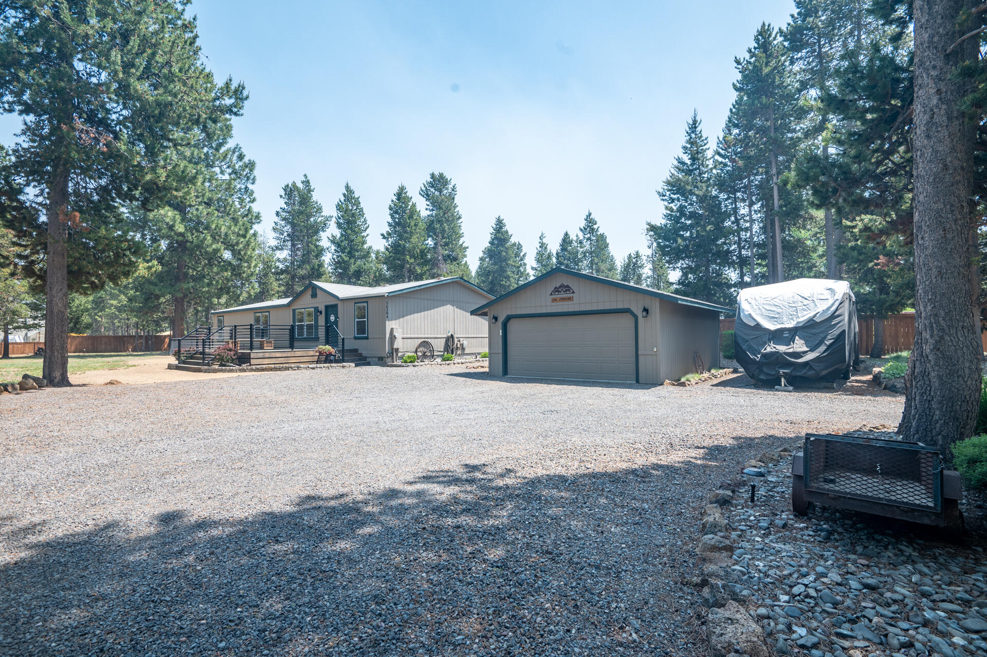Welcome to this beautifully maintained 3-bedroom, 2-bath home situated on a serene 0.59-acre corner lot in Oregon Water Wonderland. Pride of ownership is evident throughout this 1,500+ sq ft residence, offering clean, functional living and a true sense of tranquility both inside and out.  New fencing, deck, railings, flooring and other upgrades throughout. Step outside and enjoy the natural beauty of Central Oregon. You're just a stone's throw from the Deschutes River, minutes from the amenities of Sunriver, and only a 20-minute drive to downtown Bend. Outdoor enthusiasts will love the quick access to the Cascade Lakes and Mt. Bachelor—perfect for year-round adventures. Don't miss this rare opportunity to own a slice of paradise in the heart of Central Oregon!