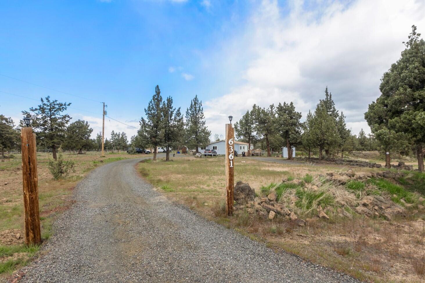 Situated in the heart of Central Oregon living out at Crooked River Ranch on 5 acres of horse property! This recently refinished home boasts an open floorplan w/vaulted ceilings, new flooring throughout, large windows for an abundance of natural light, newly remodeled kitchen, new ATT system added to existing septic, ADU & more! Main living area is bright & spacious w/a cozy  wood burning fireplace. New kitchen features full height backsplash, plenty of prep/counter space & cabinet storage, all appliances included, w/oversized dining area & additional family room also adjacent. Large primary bedroom ftrs walk in closet, step in shower, & new vanity area. Three additional bedrooms share a full bath in the main home. Lock off ADU has kitchenette, living space, bedroom & bath. Plenty of space outside for your RV (RV Dump), toys, pets & more! Pool can stay or go. Short distance from CRR resort amenities! Home has been moved twice - lending options available for VA & Conventional buyers.