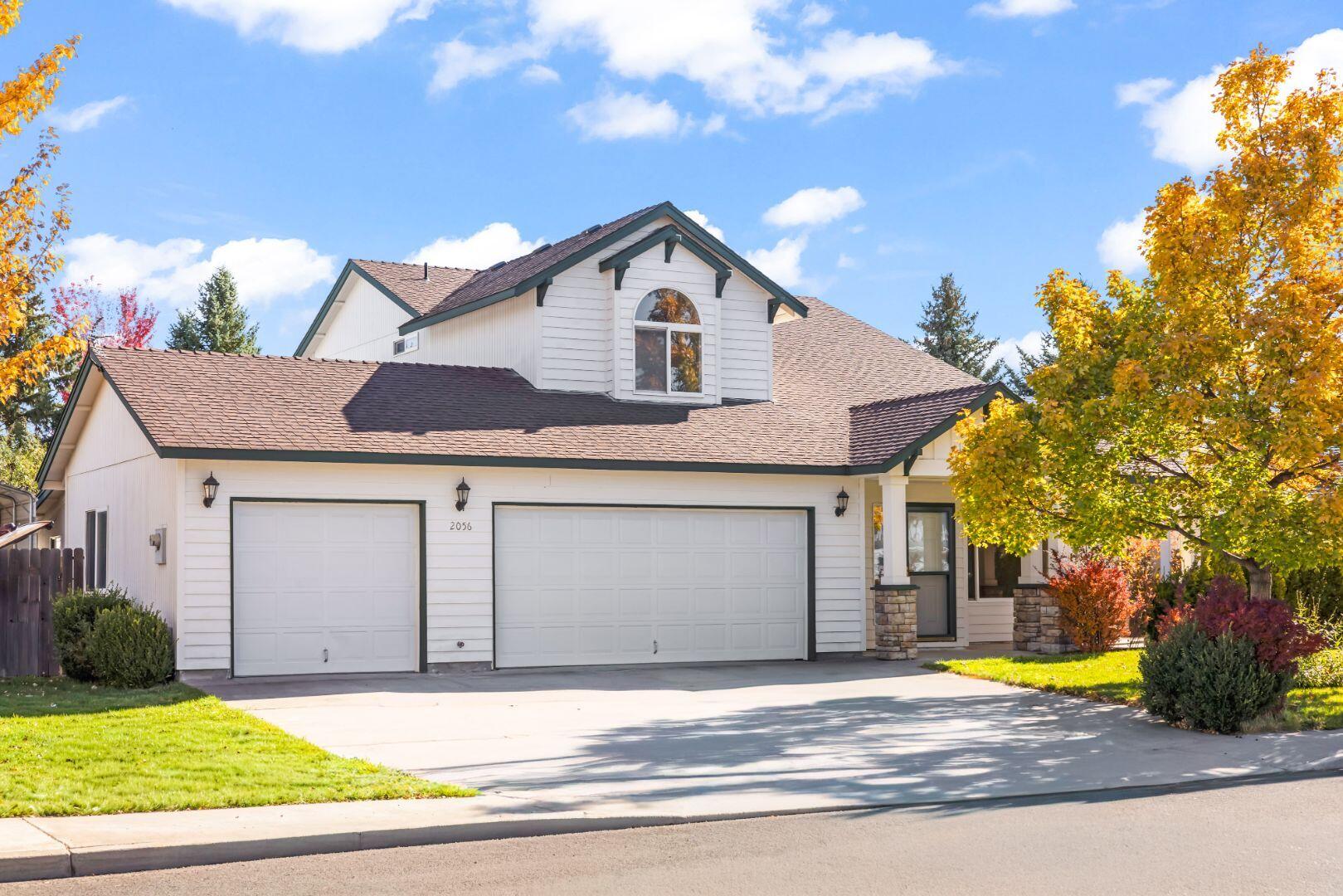 Welcome to this beautifully maintained 3 bedroom, 2.5 bath gem offering 1,768 sqft of comfortable living space in a lovely neighborhood. The floor plan features a living room, dining area, kitchen with adjacent bonus room, gas fireplace, and a convenient half bath on the main level. Upstairs, the primary suite includes a private ensuite bath and 2 closets. Two additional bedrooms and a full bath provide plenty of room for family or guests. Step outside to your own backyard oasis! Mature trees, garden area, in-ground sprinklers, hot tub, deck and plenty of space for entertaining. A rare 3 car garage with attached shed, and an RV/boat canopy provides extra room for vehicles, hobbies, or storage. Located in beautiful Redmond, Oregon, this home combines comfort, function, and Northwest charm - all just minutes from parks, trails, and local amenities.