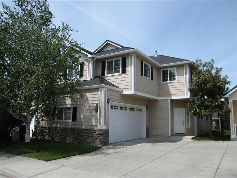 Beautiful and well maintained 2 story home in a private, quiet area in Meadowbrook Park Estates. Living and dining room have open floor plan with plenty of light, vaulted ceilings, gas fireplace, oak hardwood and carpet flooring. Spacious kitchen featuring granite counters and abundant cabinets. All appliances included. Downstairs features a master bedroom and bathroom. Upstairs is a large bathroom, two bedrooms with views and walk-in closets as well as large bonus area overlooking the living/dining room. Sliding doors off living room lead to covered patio and small fenced private yard. Two car garage. Landscape and lawn maintained weekly by HOA. Years of enjoyment can be had in this lovely home!