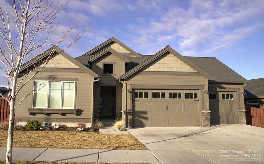 Loaded with upgrades! Beautiful Ochoco Pointe single level Pahlisch home on corner lot! 3 bd, 3 full baths, 2005 square feet. Kitchen has quartz counters, full tile backsplash, top of the line new SS appliances. New carpet & interior paint, AC, remote control blinds, custom light fixtures in entry & dining. Gorgeous floor to ceiling built in's in spare bedroom. Solar tubes throughout home for natural light. High efficiency furnace, water softener. Backyard landscaped with in-ground sprinklers & pavered step entrances. Triple car garage. Move in ready with all the bells & whistles! HOA includes front landscape care & pool access.