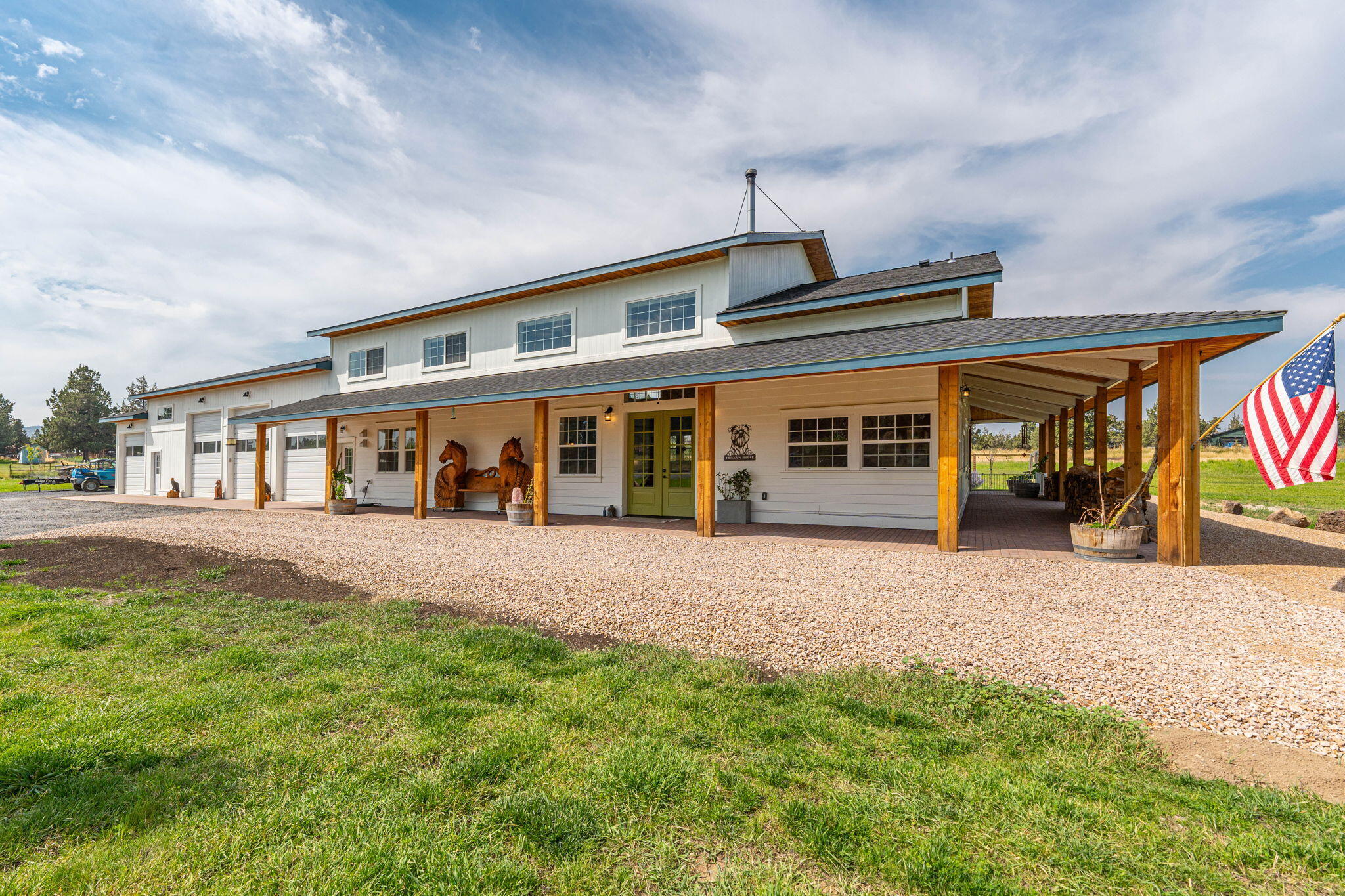 Come home to this luxurious property that is situated on 4.83 acres with 4.64 acres of irrigation rights. This stunning property offers 3,140 square feet of living space, 5 bedrooms (double master), 4 bathrooms and an office. Featuring upper-level mountain views, 2x8 insulated walls, and an open floor plan this home is ideal for both everyday living and entertaining. The kitchen is a chef's delight, with solid surface countertops and a large center island. A unique highlight of this home is the small secret room—perfect for a hidden office or a spot to house your most precious belongings. Project away in the extra-large 4 bay, 5 door garage/shop, which include 2 RV bays and built in cabinets. There's plenty of room to roam, offering endless possibilities for animals, gardening, outdoor activities, or simply savoring the tranquility of your private oasis. Don't miss this rare opportunity to own a home that combines modern luxury with boundless space.