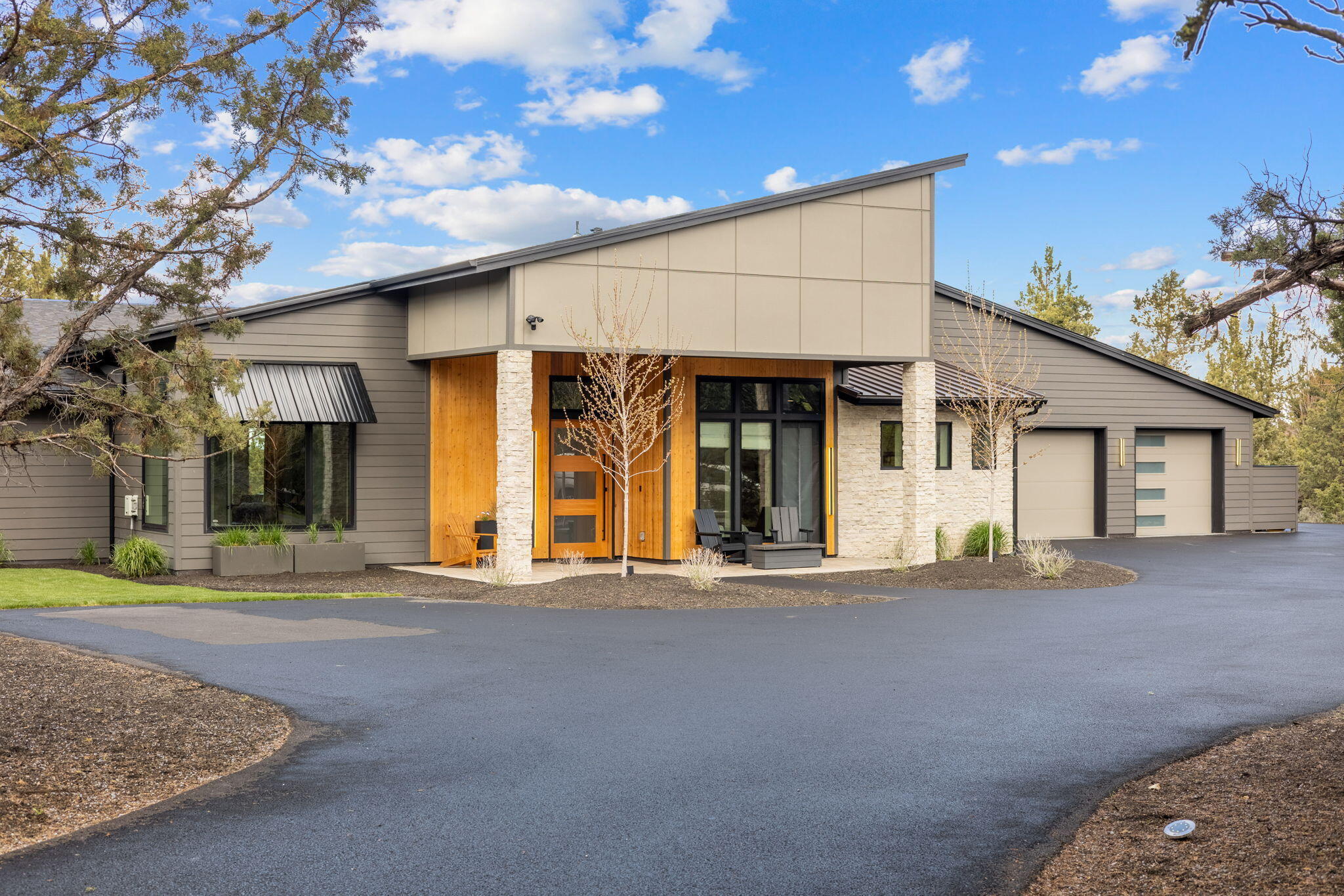 This custom designed home in Eagle Crest Resort behind the gates is very unique! Nestled at the end of a quiet cul-de-sac with privacy & located off the 14th tee box. Inside this home you will find a modern designed, open floor plan w/vaulted ceilings,14ft sliding glass door that provides lots of natural light. Beautiful high end light fixtures throughout. Cabinets w/custom options inside. SS appliances, 6-burner range & Fisher Paykel dishwasher. Quartz counters. Indoor Finnleo Sauna for health & relaxation. Master includes soaking tub, custom rain & body shower, extra large walk-in closet. Home was built w/insulated concrete form construction. 12'' thick walls. Concrete walls & floors with 6-zones of radiant in-floor heat which includes the garage. Interior floors are sealed. Garage floor & wall base coated. Metal & composition roofing. Custom metal awning. Full gutter setup w/3 covered basins. 2 paver patios w/rear one wired for hot tub & plumbed for fireplace & bbq. Large driveway.