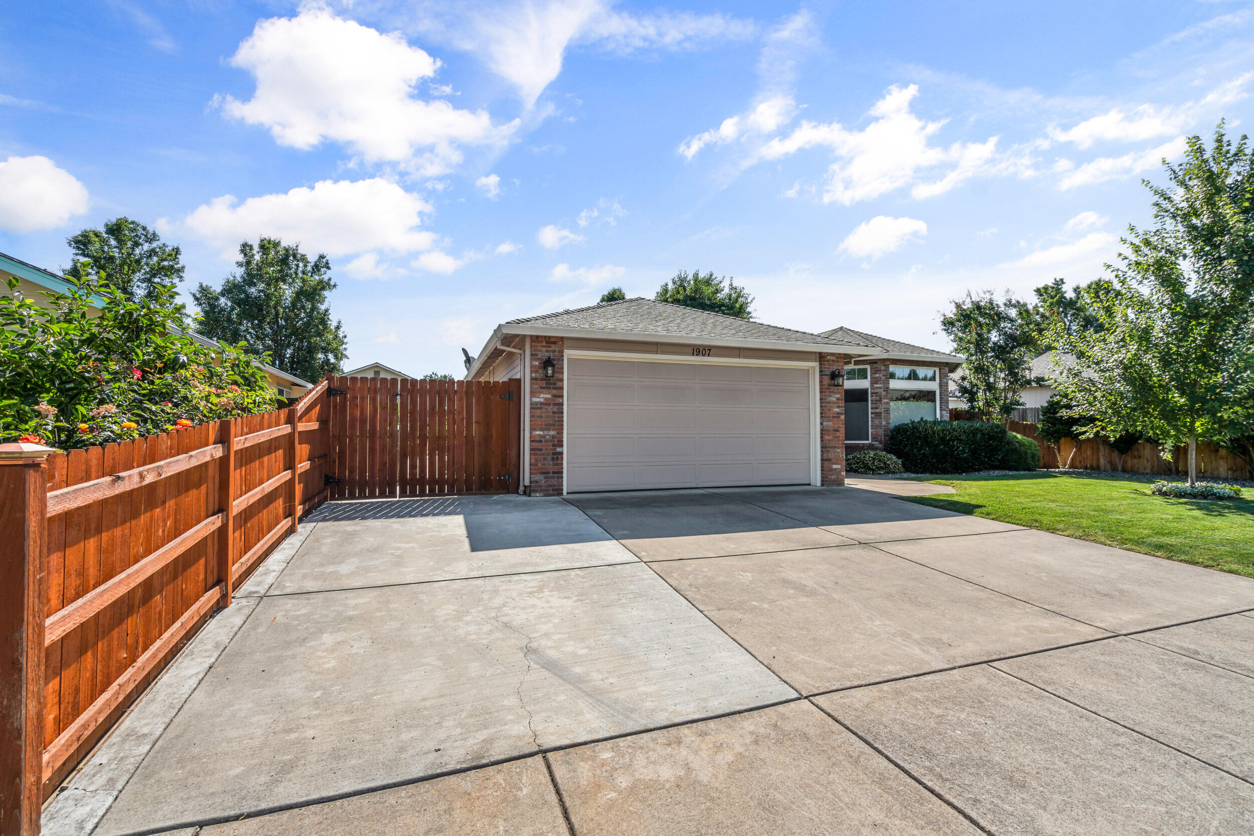 Charming and move-in ready, this 3 bed, 2 bath home on Layla Dr. offers over 1,400 sq ft of comfortable living space. The updated kitchen features modern finishes, complemented by newer flooring throughout for a fresh, stylish feel. Thoughtfully maintained inside and out, the home sits on a beautifully landscaped lot with a tidy yard perfect for relaxing or entertaining. Located in a desirable Medford neighborhood close to parks, schools, and shopping. Cute as a button and ready to welcome you home!