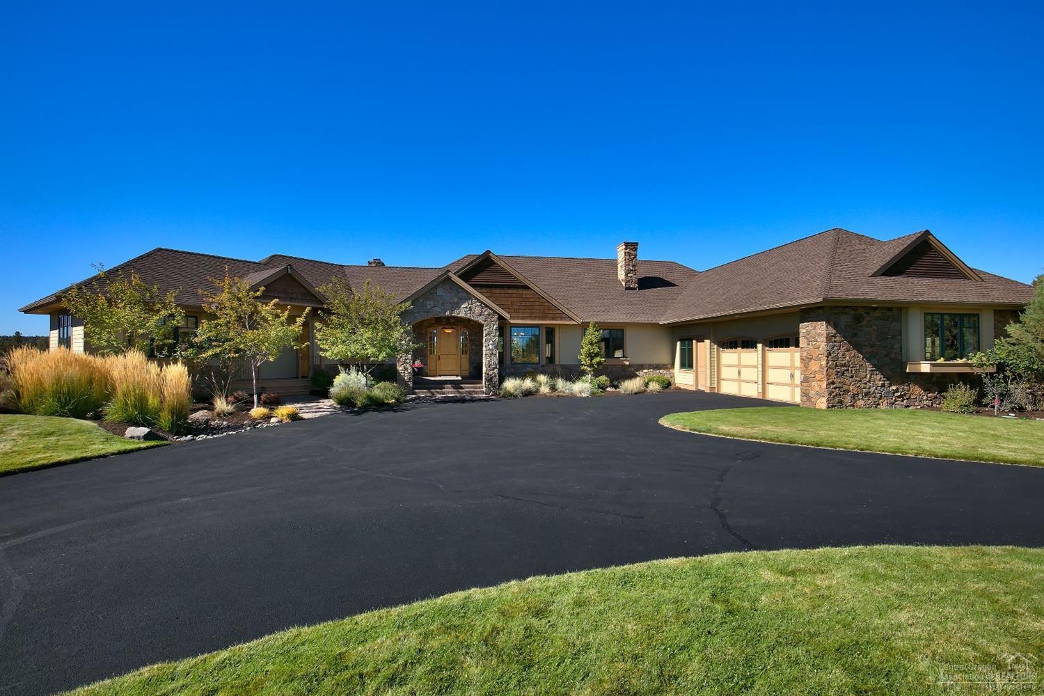 Magnificent NW Lodge Style Single Level Home w/expansive Cascade Mountain & Deschutes River Views. This beautifully crafted home features: travertine floors, custom knotty alder woodwork, slab granite and 2 stone wood burning fireplaces. Great Master separation along w/a separate office/studio/casita. Attached Oversized 4 Car Garage w/Shop Area. RV Parking w/hookups. COI Irrigation w/level pasture area. Relax on the paver deck & listen to the river! Private & Secluded Location!