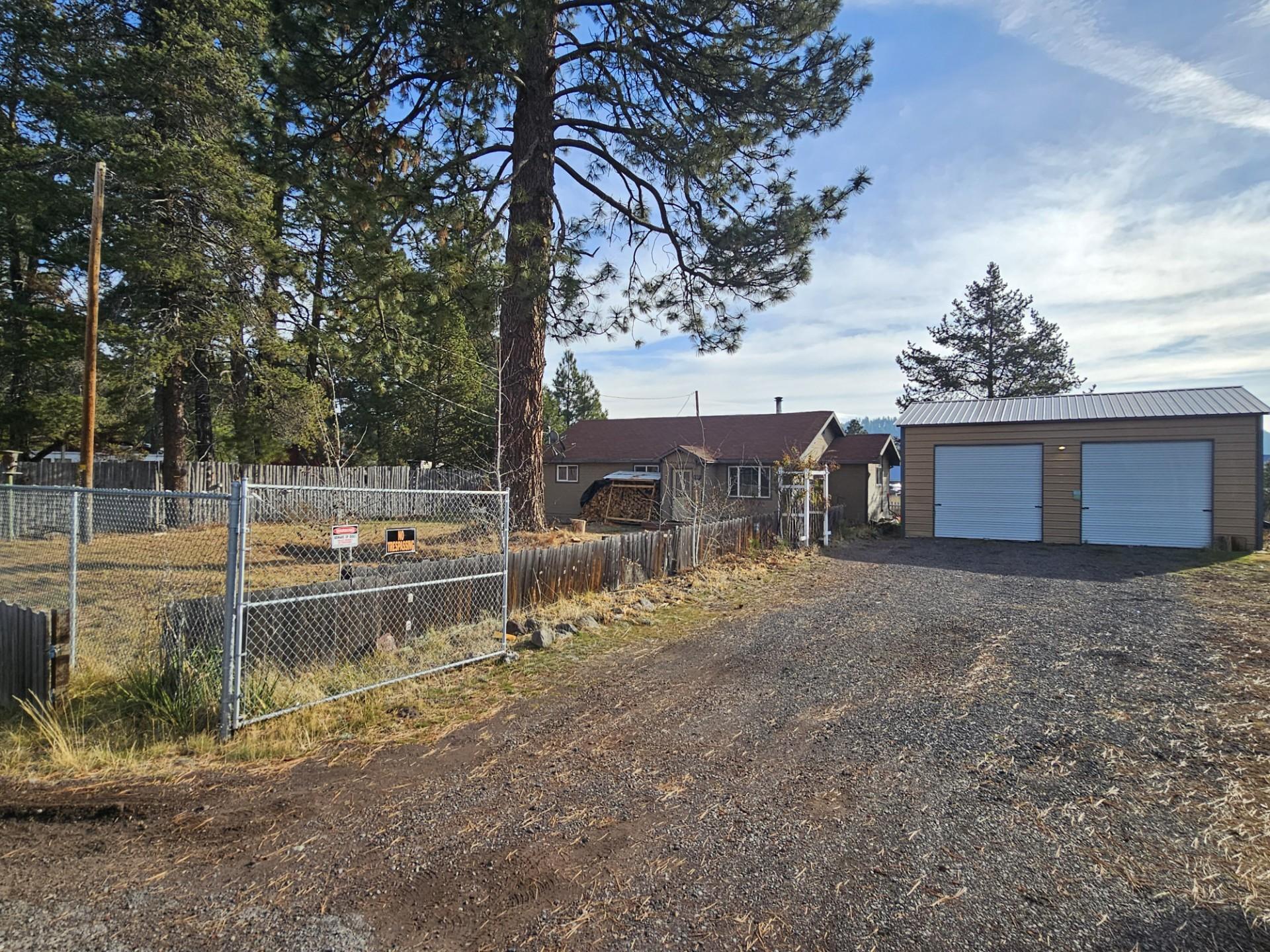 Outskirts of Chiloquin just past the Tribal Campus. In a good location with almost ½ acre and two car garage with shop area and storage. Easy access to downtown Chiloquin amenities and not far from Hwy 97. The backyard is fenced, and this property provides privacy an country feel without living to deep in the woods. The road in front of the home is maintained, and snow removal is free. Sellers are motivated to relocate from this area and will consider all offers.