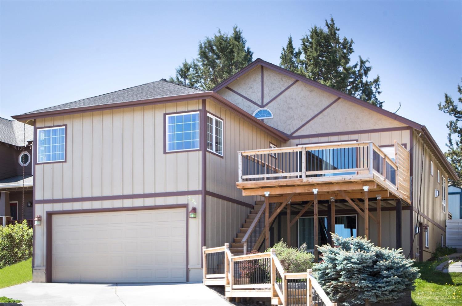 Fabulous Cascade Mountain views. Luxurious master bath with jetted tub and separate glass shower. Large open floor plan with great room and lovely views. Gourmet kitchen with large pantry and granite counter tops. This home has a apartment or Mother in Law quarters on the main level. A large utility room upstairs and additional utility closet in the apartment downstairs at the main level. Newer paint inside and out and newer carpet.  Fenced backyard and 3 car garage. Heated Driveway.  Skylight in MBR. Central Vac System. Large deck to relax on and enjoy the beautiful views.