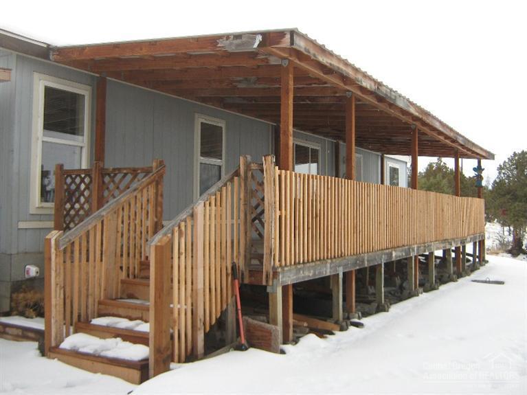 Million Dollar View of Prineville and foothills, 3 bedroom, 2 bath, well maintained manufactured home, spacious kitchen, vaulted ceiling in dineing and living room, almost new title o kitchen counters, almost new carpet in dining/living room area. Enjoy the Vast Valley Views from a private covered deck. Storage building, raised garden beds. Home is located on a low traffic cul-de-sac. Highlands Community Water.