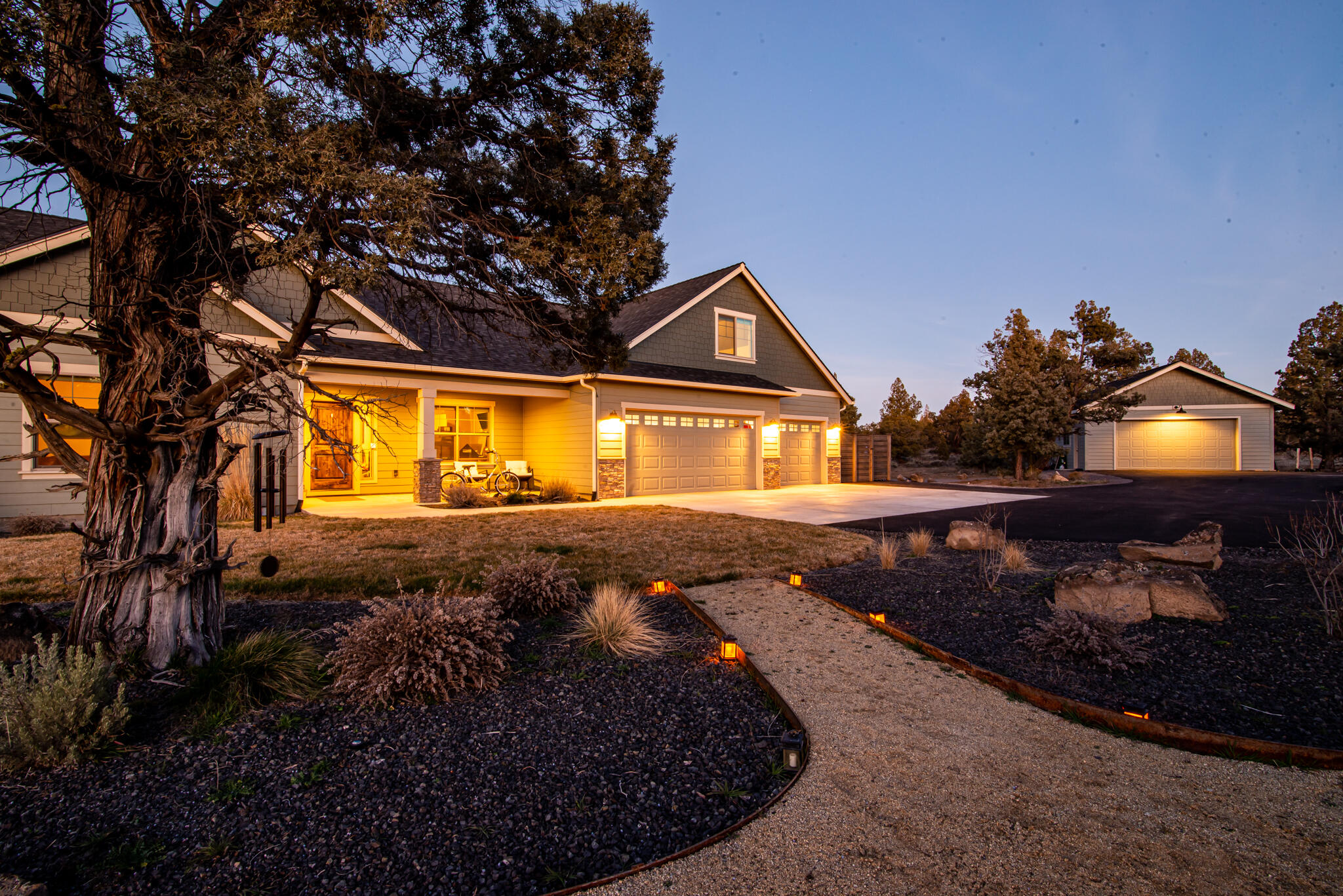Tucked away in the prestigious gated community of West Powell Butte Estates; offering a multi-generational, energy efficient custom built home in 2022. Private 20 acre setting amongst the junipers and sunshine! Boasting three ensuites of which one is a full apartment with a wet bar, two additional bedrooms, office and media room. Beautiful finishes and energy efficient details throughout the home. Spacious kitchen with large eat-in island. There is an oversized bonus room and bathroom above the 3 car garage w/ EV plug in. Enjoy the heated shop with shelving.  This retreat is also equipped with solar panels w/ app output, triple pane argon gas windows, plug in ready back-up generator power for both home and well, a Fuhrman generator. Enjoy the outdoor spaces and patio water feature. Make this your private sanctuary while conveniently located just minutes to Redmond and easy access to Bend.