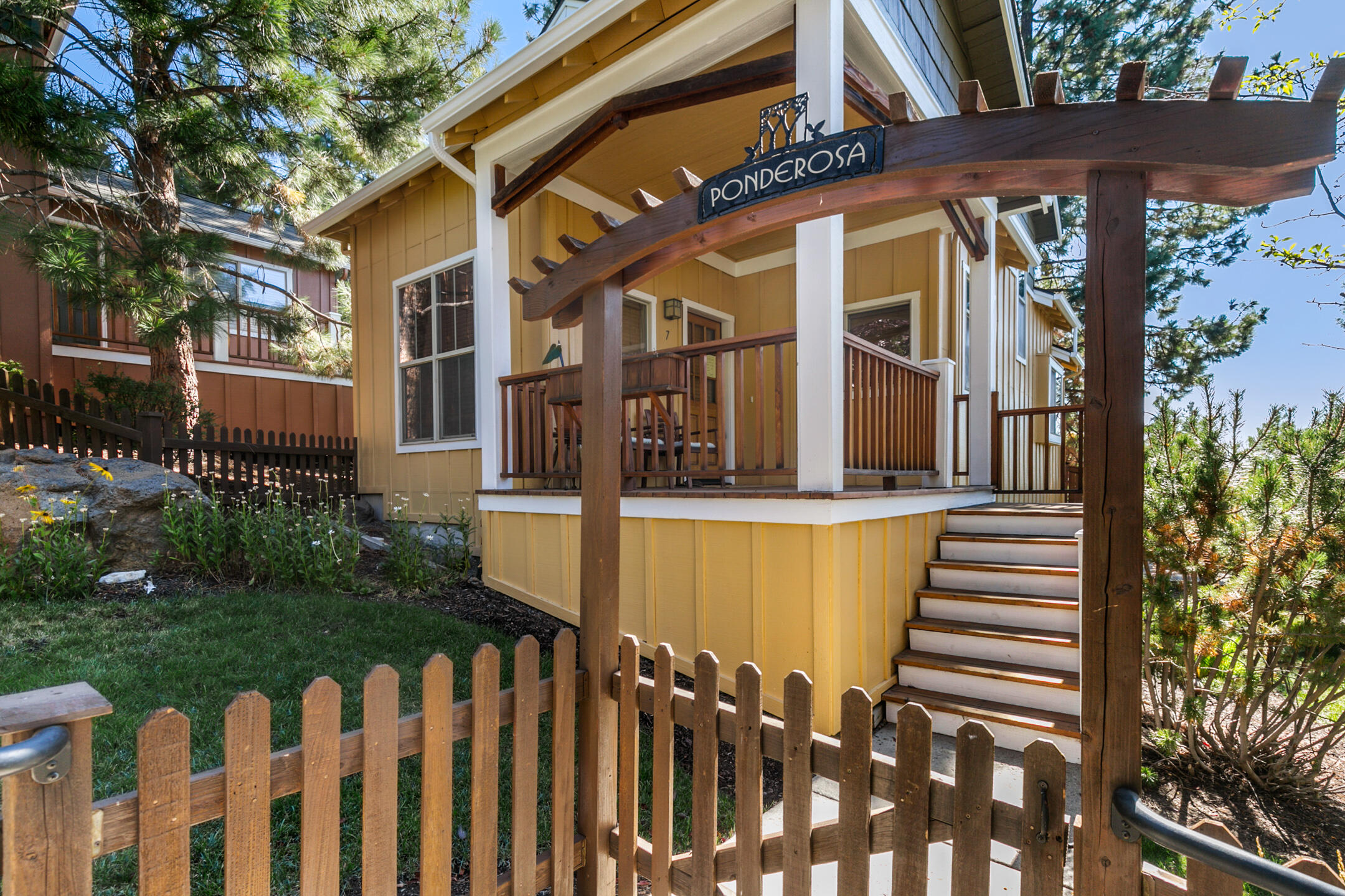 OPEN HOUSE SATURDAY 9/4 FROM 1-3PM. Enjoy all that Bend has to offer in this charming Cottage with cozy outdoor living spaces and amazing front porch. Great location close to Downtown, the river, and nearby walking trails. Tons of natural light! Kitchen with eating bar opens to living room with fireplace and dining area with built-ins. Primary bedroom and bath on main floor.  Upstairs loft perfect for an office or guest space.   This Westside Cottage is a must see!