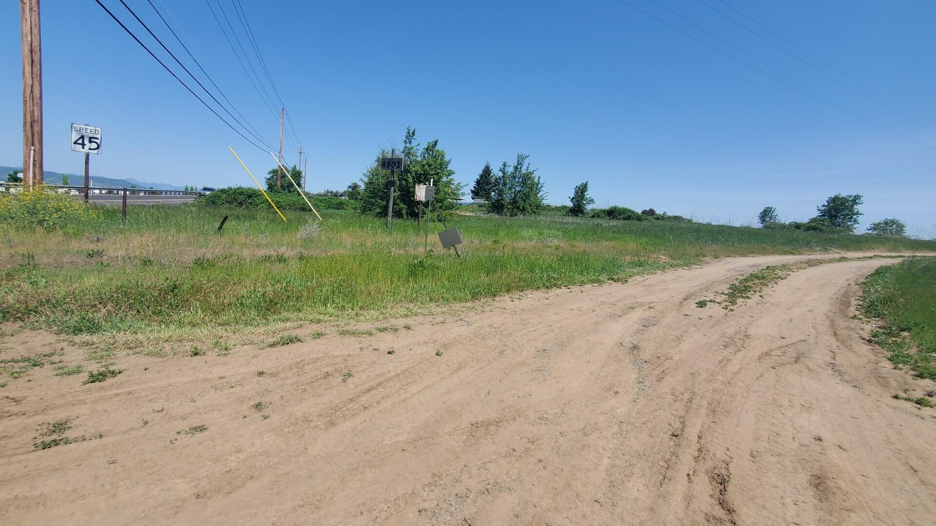 Prime commercial opportunity awaits on 11.27 acres just outside Medford's. This shovel-ready property offers immediate development potential with utilities delivered street-side to each lot by an established developer. Located within Medford's coveted Opportunity Zone, investors gain substantial tax advantages while positioning their business in a rapidly expanding 187-acre master-planned community. This project has already secured all necessary approvals—simply bring your commercial vision and watch it materialize with support from a respected local development team. As part of the City of Medford, this property presents versatile options for retail, medical, hospitality, or mixed-use concepts. Act now as surrounding residential lots are selling quickly, ensuring a built-in customer base at your doorstep. Don't miss this rare combination of prime location, tax incentives, and development-ready status in Southern Oregon's fastest-growing corridor.
