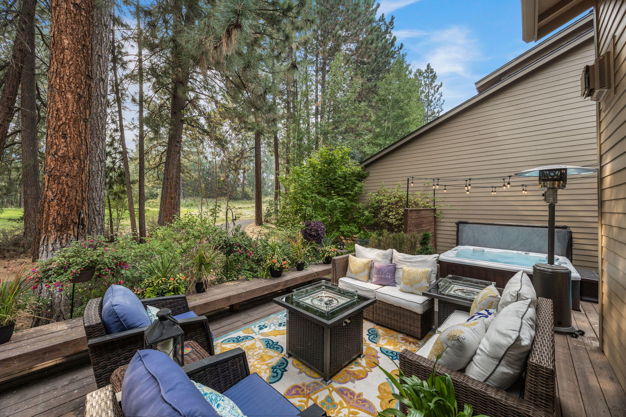 Huge $104,000 Total Price Improvement! Do not MISS this opportunity! Est Investment Cap Rate over 6.5%. Located in the desirable Widgi Creek - Elkai Woods neighborhood in SW Bend, this beautifully updated home features new flooring throughout, a refinished outdoor deck, & recent upgrades to meet Firewise community. The open floor plan offers seamless indoor-outdoor living, abundant natural light, and inspiring outdoor spaces. The sun-drenched great room with vaulted ceilings flows effortlessly to a sophisticated al-fresco veranda with a seating area, BBQ, external storage, and a private hot tub. The designer kitchen includes a breakfast bar, dining area, & great room w direct backyard access. The main level also hosts the primary suite, a 2nd bdrm with an en-suite bath, ample storage, a laundry room with a sink, & attached 2-car garage. Ideal primary, secondary, or investment residence, w eligibility for vacation short-term rental. Enjoy close proximity to parks, trails, & Mt.Bachelor