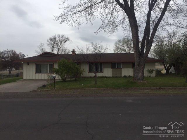 Spacious 4 bed, 1.5 bath, 1747 SF home located in an established neighborhood. Living and family room, forced air central A/C, fully fenced yard. Updated window, well loved and it shows!