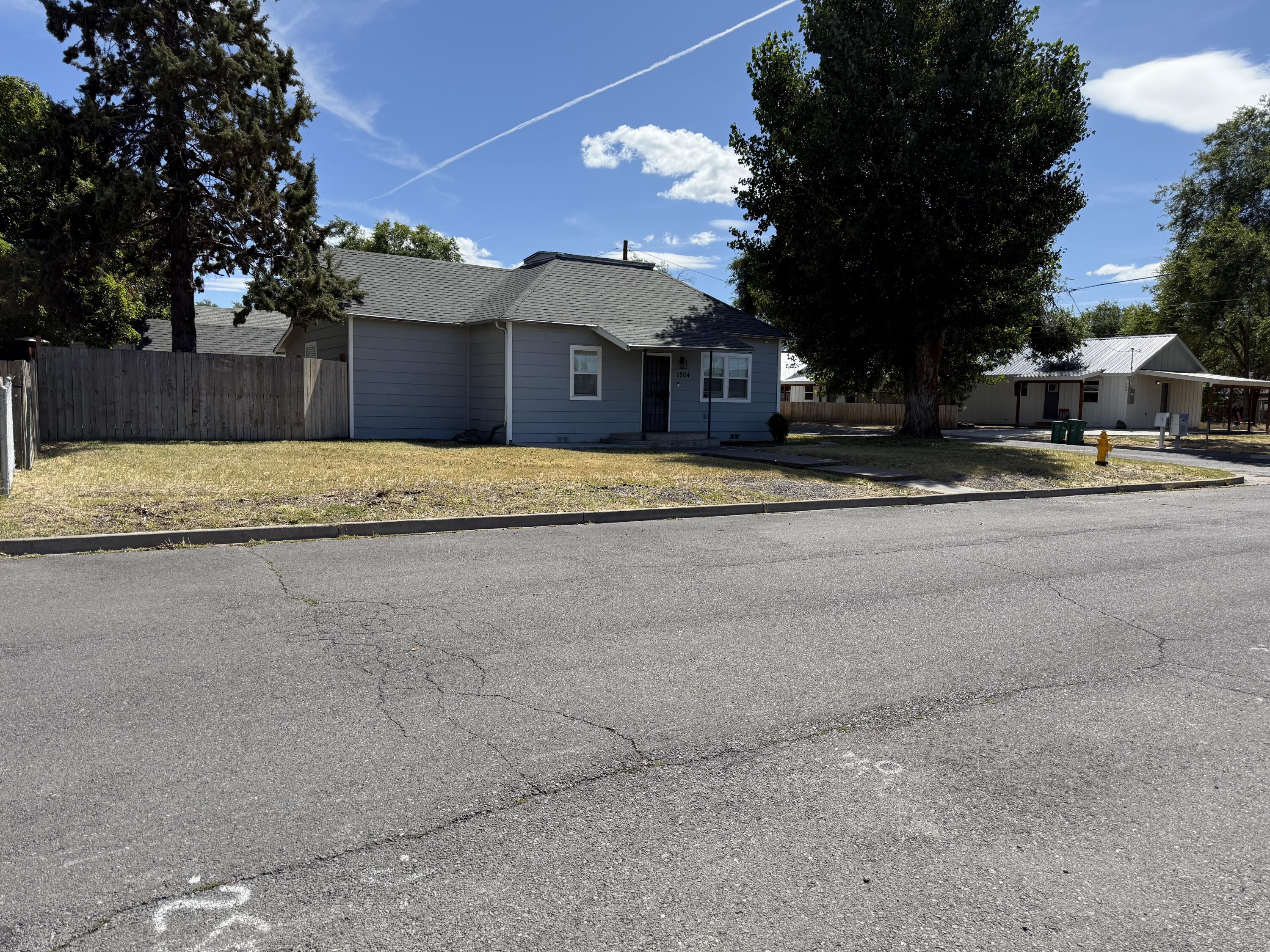 Super clean 3 bed 2.5 bath home on a corner lot. One of the 3 bedrooms is the loft area with approximately 225 sq feet. Appliances, flooring, painting and kitchen counters have been updated in the last few years. Roof was installed new in 2015. This property features a fully fenced back yard with a private deck as well. There is a detached over sized single car garage/shop as well! Good location on a quiet street with good neighbors. The floor plan provides privacy for both of the downstairs bedrooms as they are on opposite sides of the home, one with an en suite bathroom and one with a bathroom next to it. Come see for yourself if this house checks all of your boxes!