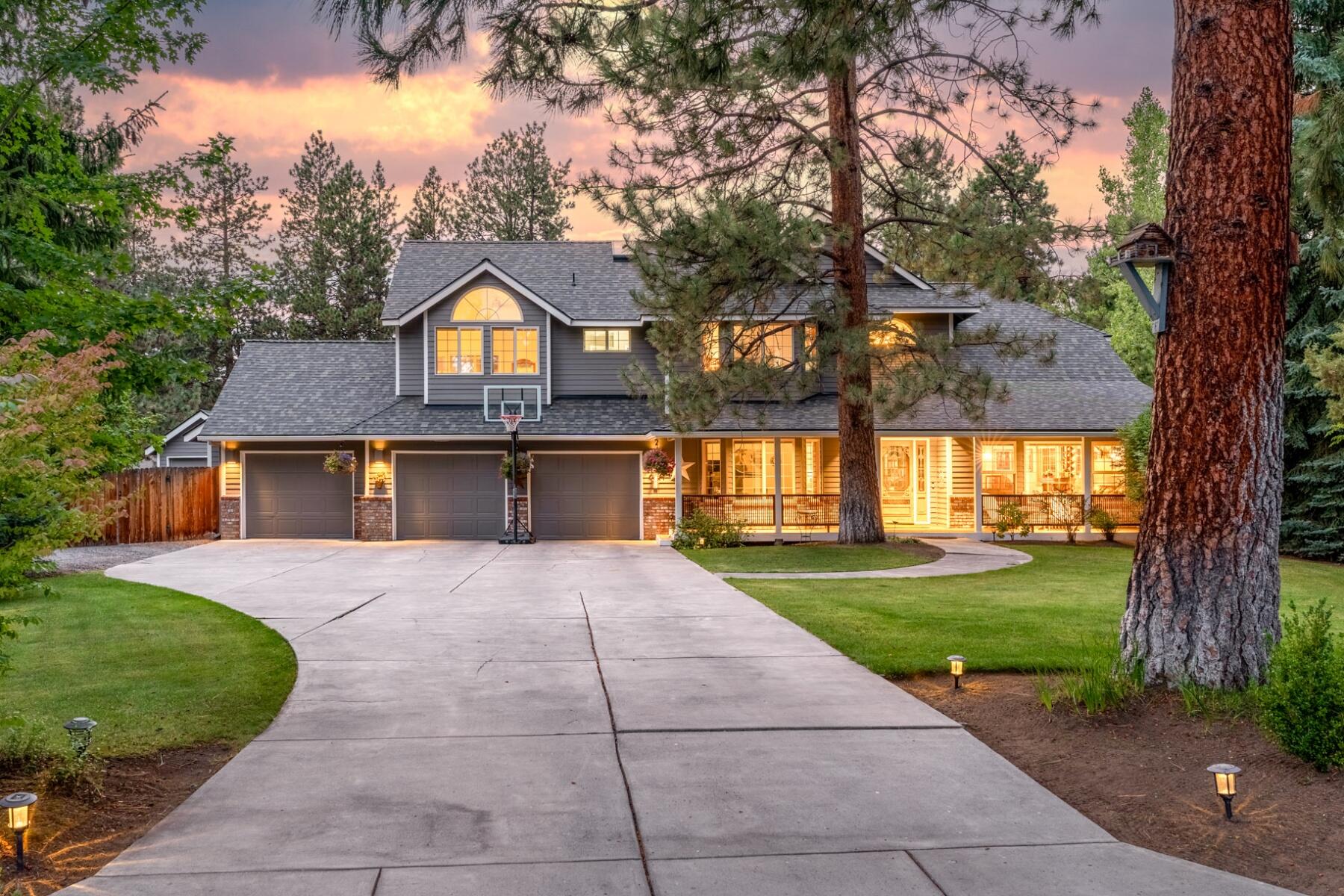 Discover the perfect blend of privacy, space, and convenience in Southeast Bend's Ponderosa Estates. Set on nearly half an acre, this updated home offers an open layout, soaring ceilings, and abundant natural light. At its heart, a modern kitchen with a central island and premium finishes is ideal for gatherings. A main-level office with an adjacent full bath adds flexibility for work or guests, while the spacious upstairs primary suite provides a private retreat with a large bath and walk-in closet. Outside, enjoy a fully fenced backyard with mature trees, a storage shed, and RV parking alongside a three-car garage. Just minutes from downtown Bend and close to new dining, amenities, and the soon-to-open library, this home invites you to relax in the hot tub or stargaze on the patio—Central Oregon living at its finest.