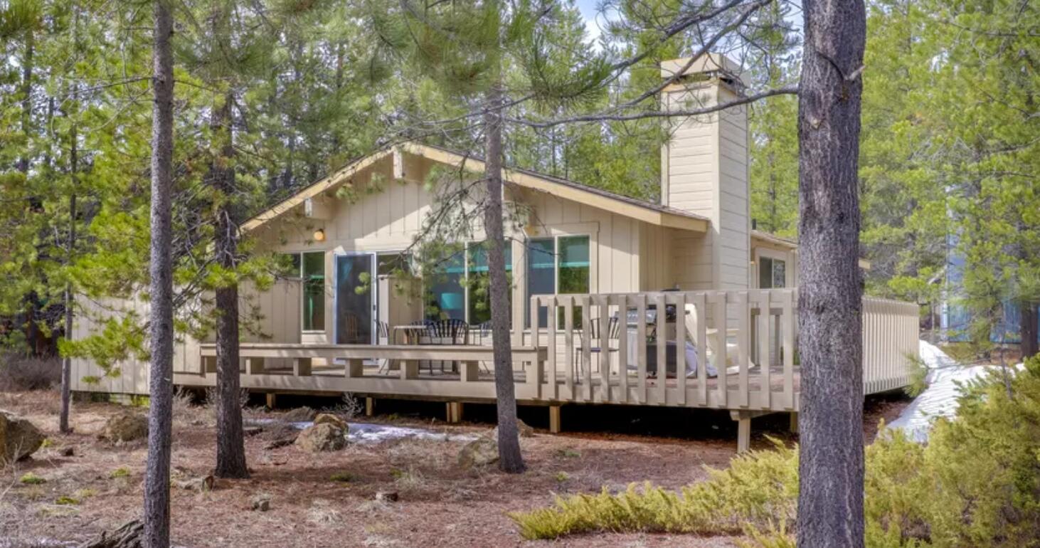 Create your own memories in this true Sunriver cabin that's close to Fort Rock Park!  Wake up on crisp summer mornings to the deer slowly grazing by, spend the warm evenings dining al fresco on the huge deck.  Or cozy winter afternoons doing puzzles, watching bowl games or warming yourselves in the hot tub, star gazing and watching the snow fall.  With soaring beamed ceilings, huge south facing windows, lava rock wood burning fireplace, pine beetle wood countertops in both baths, you'll love the classic high desert vibe in this rustic cabin.  Perfectly sized desirable rental, fully furnished, one level home with 2 beds, 2 baths, and loft in 2nd bedroom, this is a home in which you'll make the memories of a lifetime.