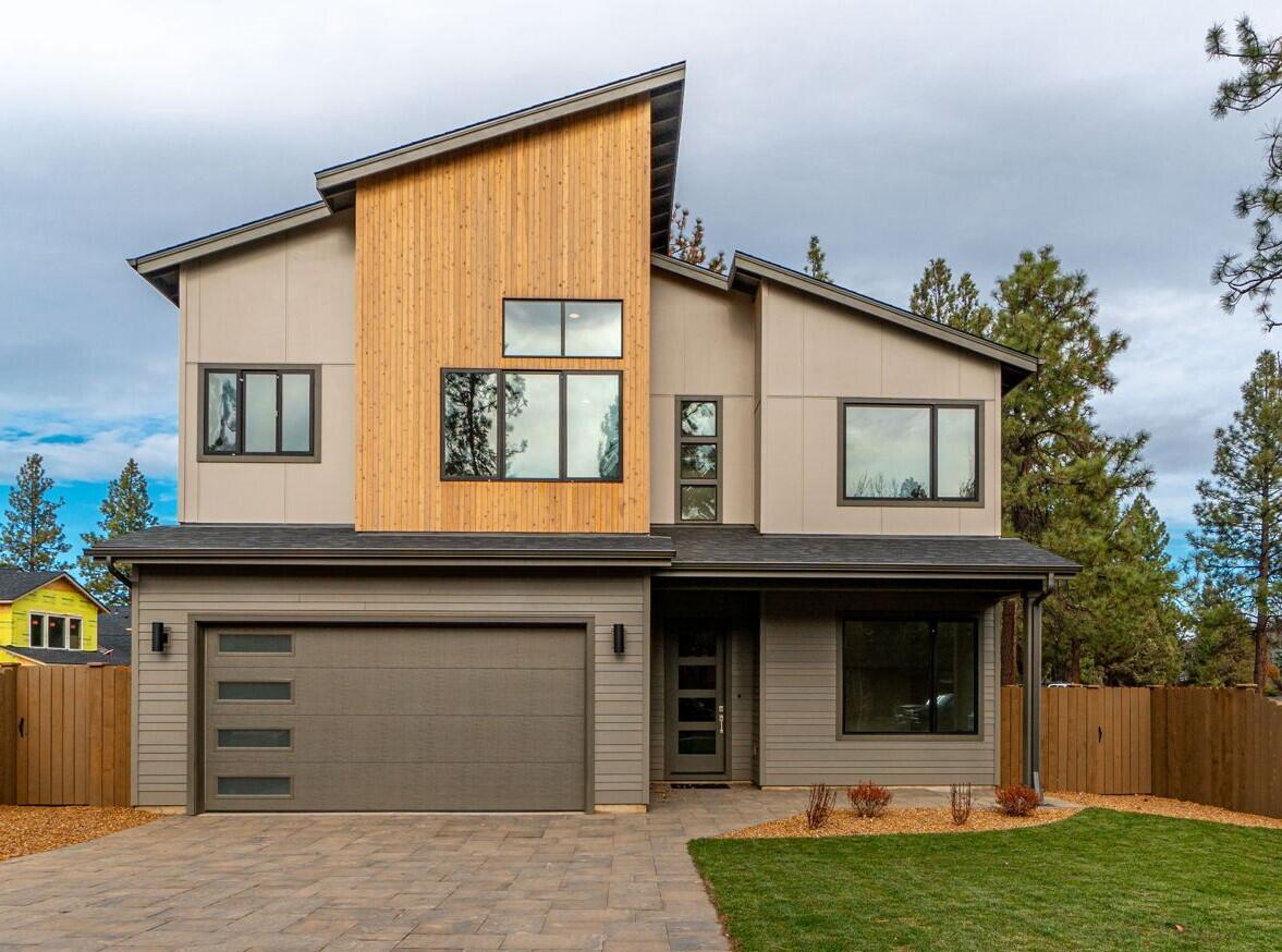 Just finished November 15th! Introducing a brand-new home by RD Building & Design LLC, offering a distinctive 3067 sqft mountain modern design nestled in an idyllic setting. This property boasts 3 bedrooms, 2.5 baths, a bonus room, and a dedicated office. With black-framed windows and two water heaters, it features 10' ceilings and vaulted areas that accentuate its open, airy feel. The primary suite is conveniently located on the main level and includes a luxurious walk-in tiled shower and a relaxing soaking tub. The home showcases hardwood flooring throughout and a chef-inspired kitchen with quartz countertops and commercial-style stainless appliances. This home has ample storage, including the 4-car tandem garage! Outside, find a fully fenced, professionally landscaped front and back yard ready for your enjoyment. An A/C system ensures your comfort throughout the seasons. The seller is offering $20,000 towards Buyer's closing costs.