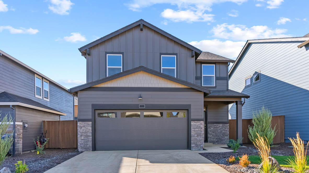 Red Tag Sale Happening Now!! Move-in new construction in Bend! Stevens Ranch in Bend is your gateway to serene living near Reed Market Rd, close to nature and historic downtown. This magnificent Porter two-story floor plan has 5 beds, 3 baths, with a bed and bath on the main floor that is ideal for an at-home office or a guest bedroom. The great room has designer features with a fireplace. The lavish kitchen has beautiful shaker cabinetry, quartz countertops with backsplash, and stainless-steel appliances like a gas range/oven and microwave. The primary bedroom is spacious, it has a walk-in closet, and an en suite bathroom with a double vanity. The hall bathroom adds extra comfort with a double vanity as well. 

Special interest rate promo and closing cost credit offered with preferred seller. Call for details. Sales office hours are 10am - 5:30pm daily. Photos are representative of plan, features/specs may vary.