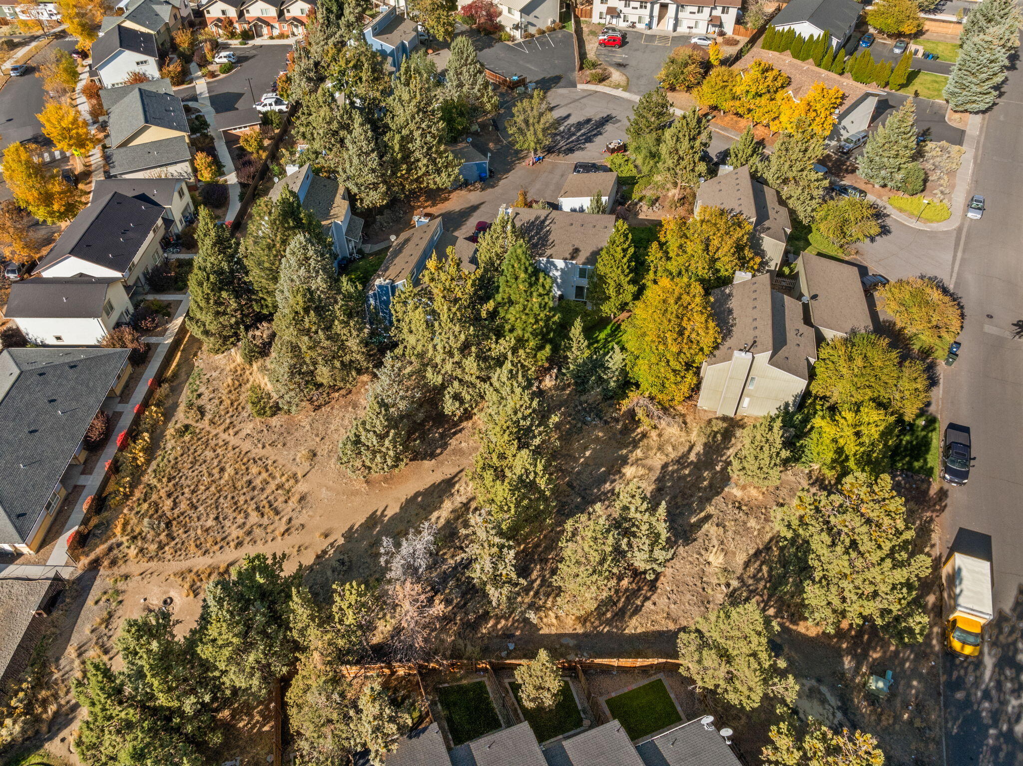 Versatile and well positioned for infill development, this .46 acre RM zoned parcel offers multiple paths forward and strong upside potential. The property previously received conditional approvals for a 29 unit micro apartment concept, and alternative plans with bids for five duplexes are also available, illustrating flexibility under current zoning. Utilities are nearby, and the site's generally mild terrain allows for efficient preconstruction planning. Current RM zoning supports a variety of infill configurations including small multifamily, duplexes, cottages, shared courts, and middle housing land divisions, offering a range of project options for builders and investors. Located in established NE Bend near St. Charles and a growing number of nearby amenities and medical campuses, this site presents an outstanding opportunity for small scale multifamily, duplex, or rental housing development. Buyer to conduct independent due diligence.