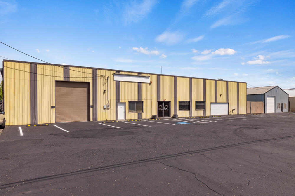 Fully fenced clean and level Heavy Industrial property located across Washburn Way from Super Wal-Mart is now available to the right buyer The proper location is one of the most important aspects of running a successful business. The town has grown up around this property, and now its 5.45 acres sits in the heart of the new business area. and in the center of what is becoming, Klamath Falls Auto Row. Along with the 5.45 acres there are 2 large and one small building that total 9,645 sq. ft. The 4,536 sq. ft. main area fronts Washburn Way, the most traveled street in the newer part of town.