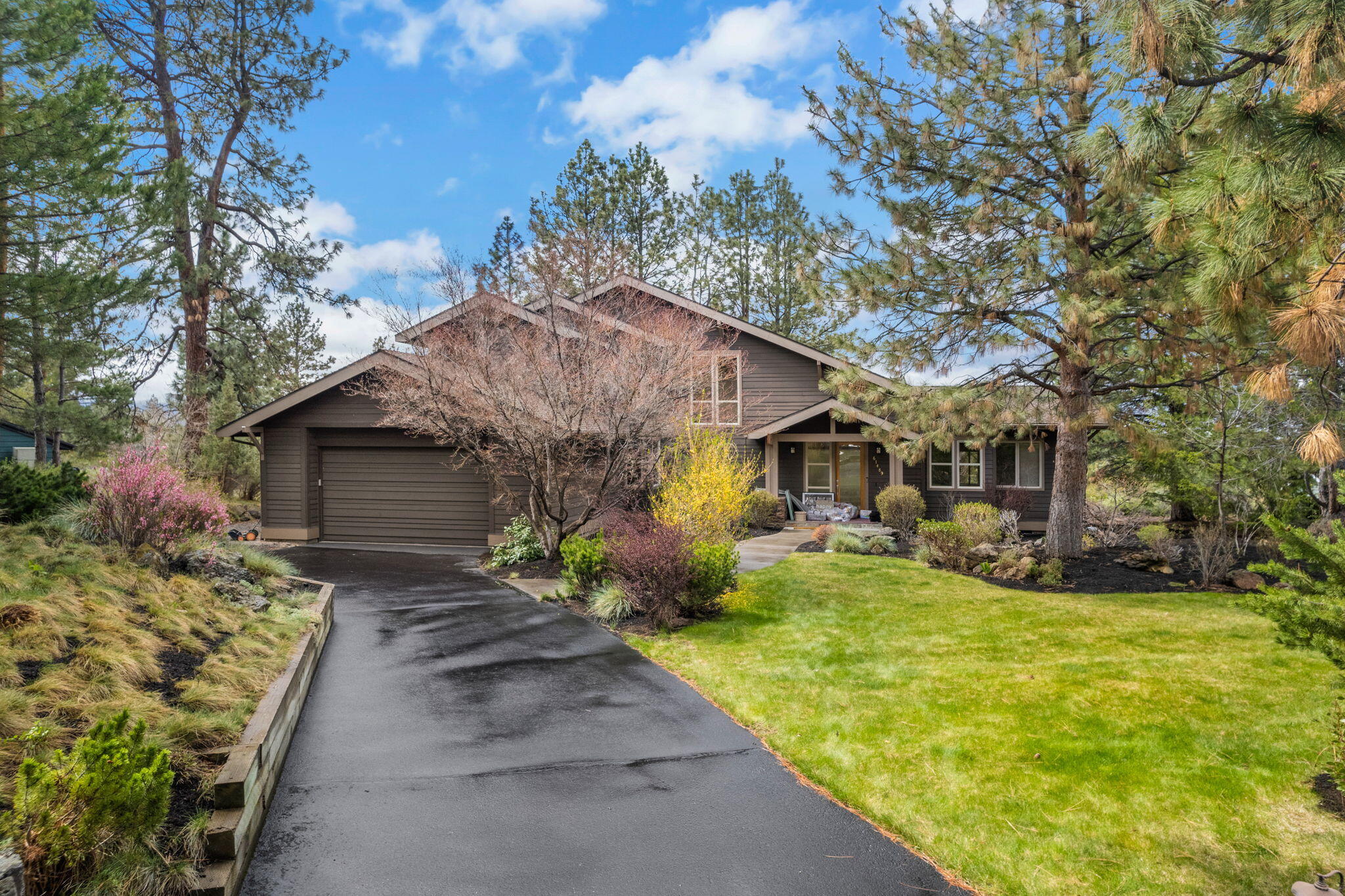Peaceful Paradise with Cascade Views Awaits! Designed by renowned architect Neal Huston, this captivating haven is nestled on a quiet street in desirable west Bend. This property boasts a spacious lot, perfect for creating your own private oasis. Imagine unwinding on your deck, enveloped by tranquility, while basking in the breathtaking panorama of the Cascade Mountains. Relax in the natural beauty, while enjoying the convenience of 20 minutes to Mt Bachelor, ride your bike to the amphitheater, Phil's Trail and fantastic restaurants and shops. Beautifully updated chef's kitchen, stunning living room with full Mt Jefferson views opens to tranquil deck and mature landscaping (frequented by the local fauna), gorgeous primary suit with walk in closet and luxurious bathroom with Mt Bachelor views. Don't miss this opportunity to craft your dream life in this idyllic setting!