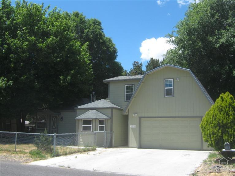 Immaculate 4 bedroom, 3 bath 2000 sq ft home, recently remodeled and feels like new. 400 sq ft private Master Suite. This home features a bonus nook, plus new carpet and Pergo flooring. Large garage with shelving and 3 attached sheds. There is more! a garden area, beautiful old Maple shade tree and RV space. Amazing Value.