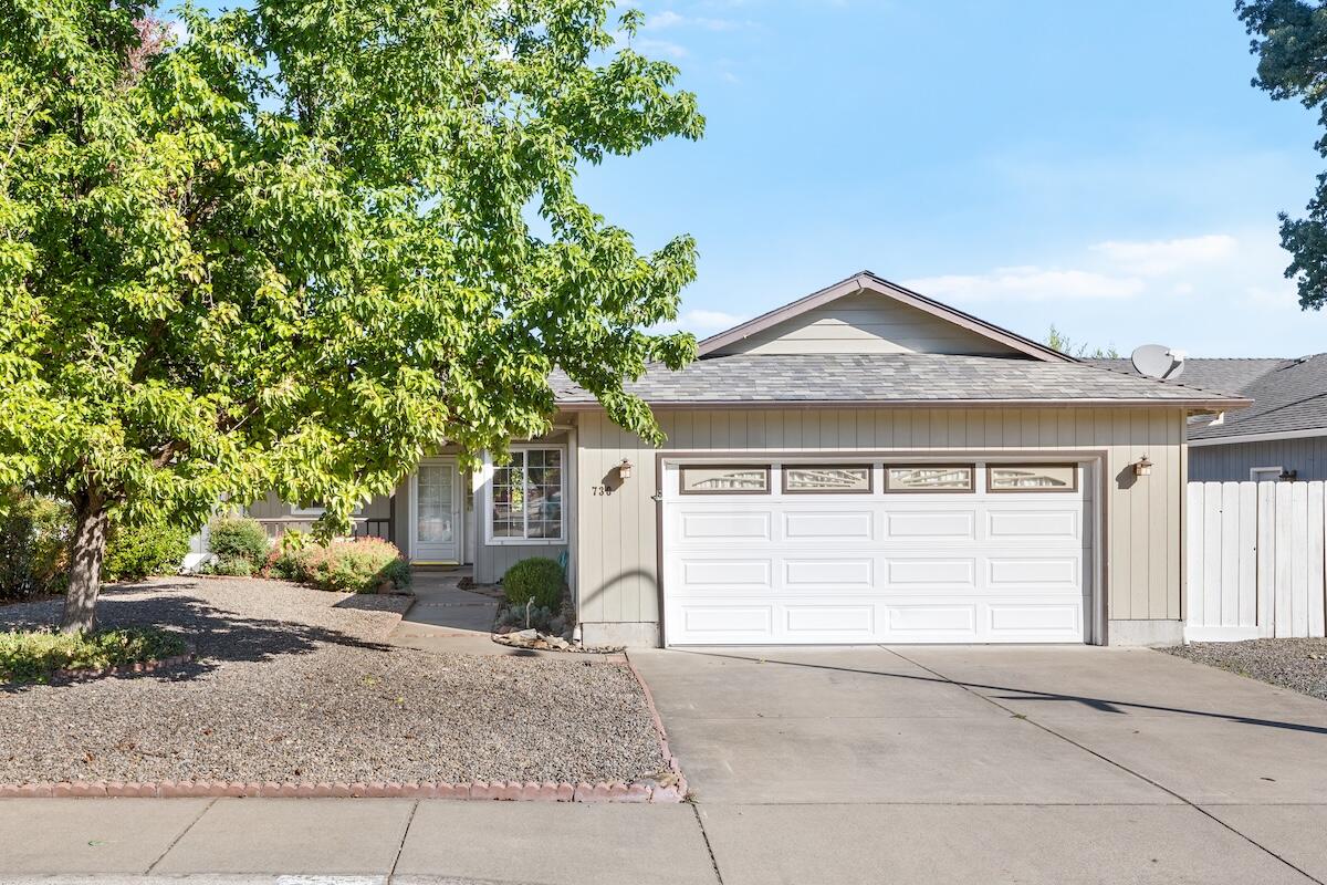 The open and friendly floorplan of this single level home will appeal to many buyers. The light and bright kitchen opens into the dining area and living room, with a sliding glass door into the back yard. Large windows bathe the living areas in sunlight. The primary bedroom has a large walk-in closet and en suite bath. Second bedroom with double doors could easily work as a home office or guest room. The third bedroom also has a large walk-in closet. Dedicated laundry room for convenience and a two-car garage with built in shelving. The front yard is low maintenance. The fully fenced backyard includes a covered pergola area, gardening bed area and mature butterfly bushes along the fence for privacy. Located in a desirable, friendly, and quiet neighborhood with slower traffic. Near South Medford High School and minutes from shopping, dining and medical facilities. Comfort and convenience in one perfect package! Price reflects the opportunity for buyer to make modest improvements.