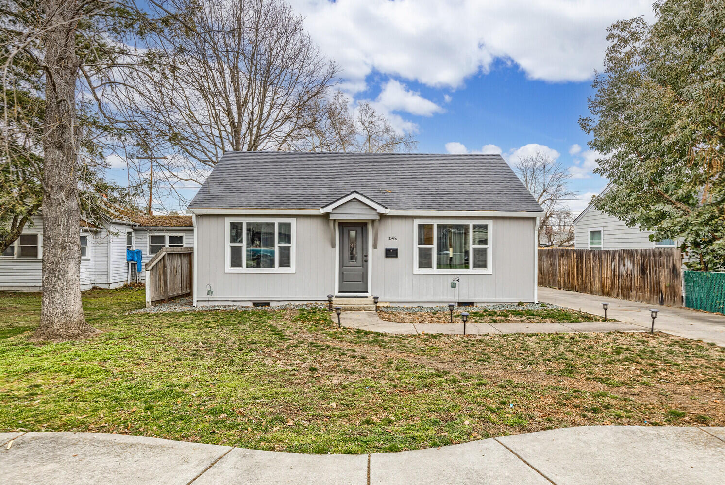 Beautifully renovated home in Medford is awaiting for you to call it home! Recently updated throughout with a full kitchen remodel, including gas range, granite countertops, and tile flooring. New light fixtures, vinyl windows, carpeting, bathroom vanity, tile shower surround, and more. This cozy home has a large backyard with alley access for RV/ boat parking, a potential ADU or so many other uses. The detached single car garage has a large finished space with a shower and compost toilet but has so much more potential! Check out this one of a kind charmer!