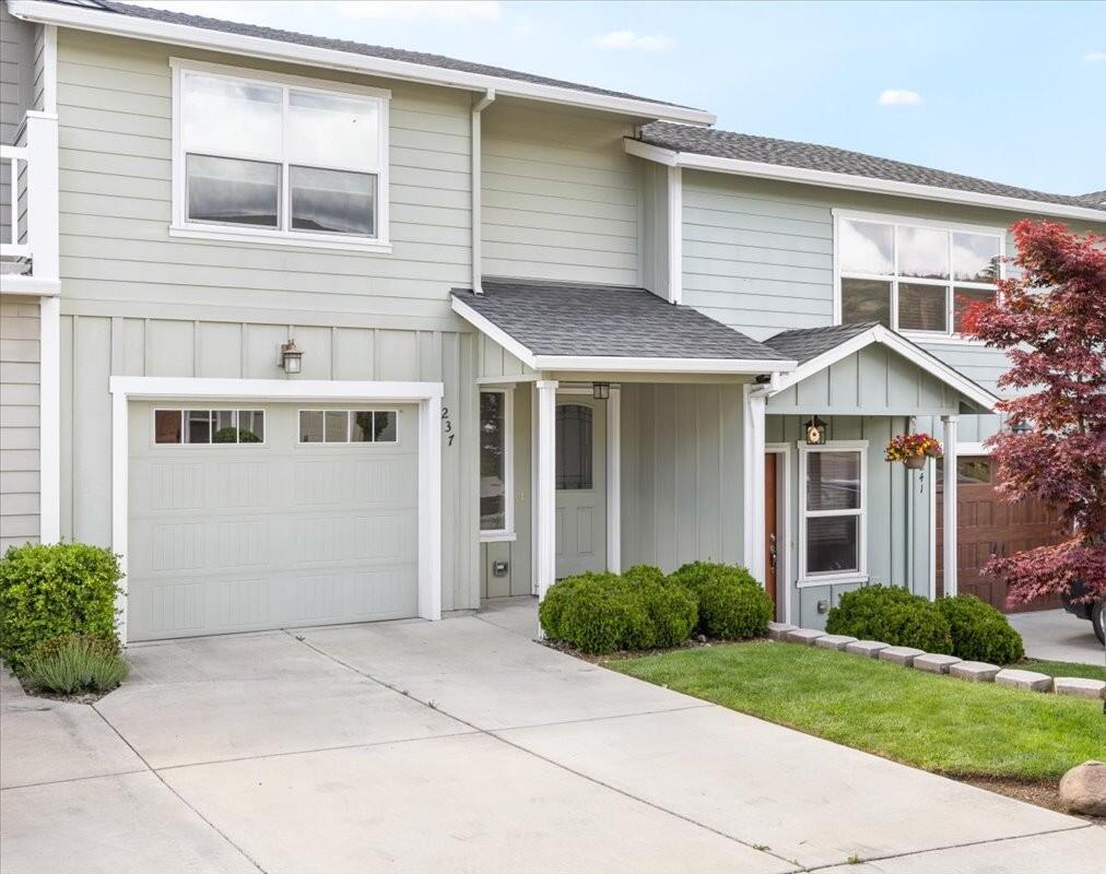 Beautiful 2 bedroom 2.5 bathroom townhome in the hills of East Medford. Brand new refrigerator and washer and dryer. Located in a quiet neighborhood this home provides comfort and privacy, while allowing for convenient access to shops, restaurants, and activities. Get the best of both worlds; quiet city living just minutes from beautiful parks and hiking trails. This home has a duel primary bedroom setup upstairs with an open concept kitchen and living room downstairs, and beautiful Hickory floors throughout. The single car garage has extra shelving build for additional storage space, and the laundry area has a utility sink. Enjoy gorgeous sunsets and the view of Roxy Ann Mountain from the second floor balcony. Seller is a licensed broker in the state of Oregon. HOA covers front yard landscaping. One of the sellers is a broker licensed in the state of Oregon