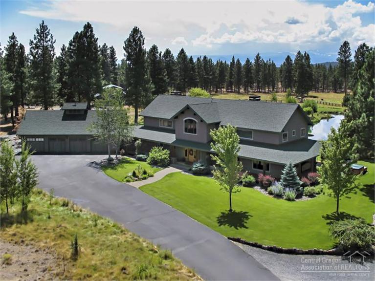 Custom Built, Spectacular Views, Complete Privacy - Need I say more? Enjoy Cascade Mnt views from inside and outside the home. Relax or entertain on the back patio with wood/gas fireplace&large pond for irrigation&recreation. Run cattle or raise Horses on 33 acres w/15 acres of underground-automatic irrigation w/5 separate pastures-fenced & cross fenced. Home also features large Barn,4-car garage,central vac,multiple heat pumps,ample storage,4 fireplaces,a Premiere Sisters Location. New Exterior Paint.