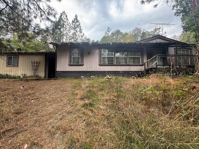 Handyman Special on 3.3 Acres Near Rogue River!
Looking for a project with potential? This manufactured home sits on mostly private 3.3 acres just 3.5 miles from downtown Rogue River—conveniently located between Grants Pass and Medford. With some cleaning, repairs, and updates, this property could really shine. Features include a one-car garage, a deck for outdoor enjoyment, and a comfortable floor plan ready for your personal touch. A great opportunity for the do-it-yourself buyer! Contact your favorite Realtor for interior pictures or in person viewings.