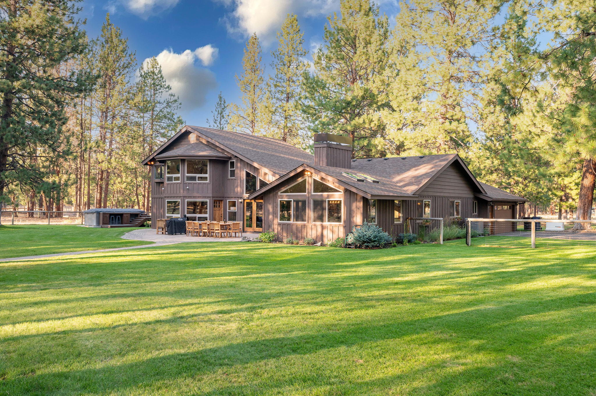 10 private acres very close to town & bordering 1000's of miles of USFS land/trails. 3525sf renovated home (4 of the bedrooms), 4320sf shop with approximately an additional 1300sf of living space (1.5 bath/3 bed/living/office) & classic barnwood 6 stall barn with 2 paddocks & corral. Home features: Lots of windows/light; Vaulted ceilings; White Oak hardwood floors in main living areas; Efficient wood burning fireplace with stacked rock; Fully updated kitchen & dining space, high-end stainless appliances, large island, custom cabinets with pullouts and 2 pantry areas; Completely private primary suite with large sitting room, walk-in closet and shower and soaking tub; Large office with ''secret'' room; Outdoor living with huge paver patio; 18' Lap/Swim spa; New roof; Generator with buried dedicated propane tank. Property features: Extensive perimeter & interior fencing with gated entry & rear access (to Pine Street); RV parking/storage/RV dump; New septic system serves entire property