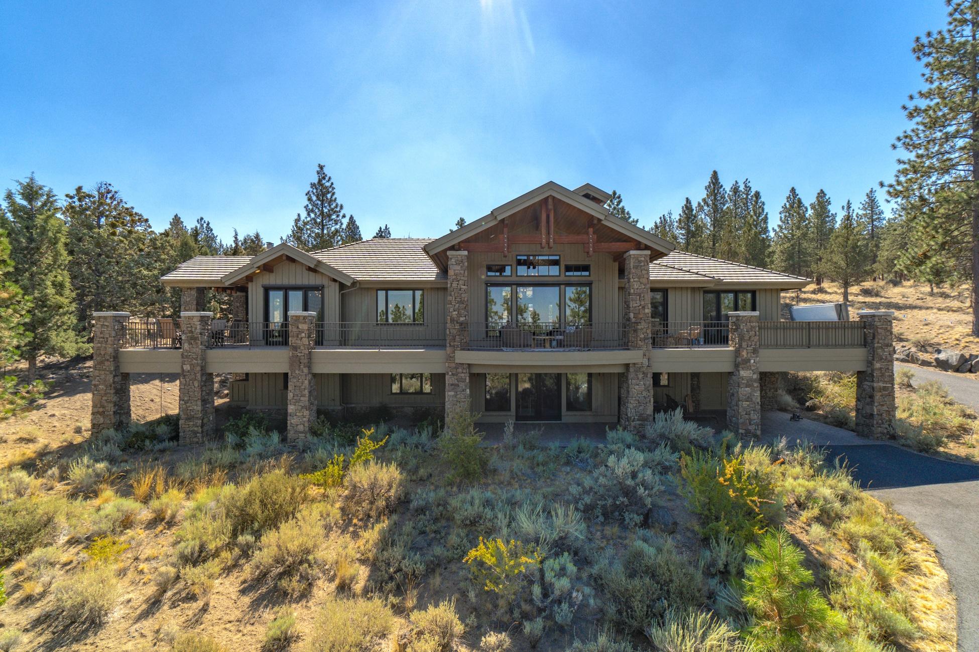 Recently updated northwest style home located on a very private 1 acre parcel in the gated community of NorthRim! Enjoy a thoughtfully designed floor plan with a large gourmet kitchen, w/warming drawer, wine coolers, built in refrigerator,drink coolers, built in cabinetry & amazing views from every room. The formal living area has a Montana Moss Rock fireplace. The main level also offers 2 master suites, office, utility room, mud room, large pantry & an oversized heated 3 car garage. The lower level boasts 2 bedrooms, 2 full bathrooms, downstairs laundry room, 2nd living room, wet bar, game room & 1+ garage space w/ options of expanding. The outdoor space provides a large deck, hot tub overlooking the beautiful Central Oregon landscape, cascade mountains & hoa common area for extra space between you & the neighbors. This is a must see property!