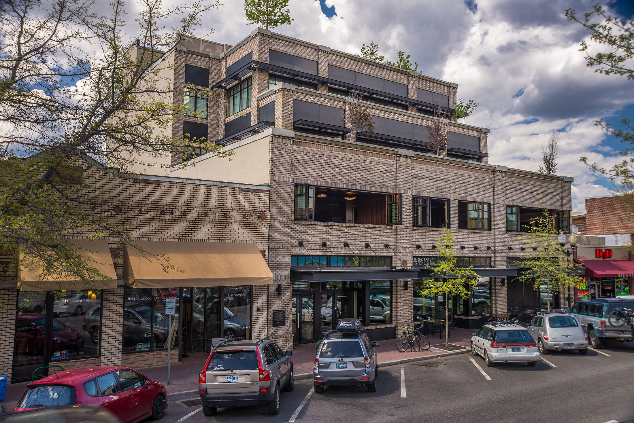 Don't miss out on this rare opportunity to live in the heart of downtown Bend.   The exclusive 919 Bond building where urban living and luxury are awaiting you.  

Step into this fully furnished gem from a secure private elevator and you'll be greeted with an open living space with abundant natural light featuring floor-to-ceiling windows and doors.  Enjoy the additional outdoor space with mountain and city views from the expansive wrap-around deck with built-in BBQ setting the perfect ambiance for relaxing or entertaining. 
Hosting will be a breeze with the well-appointed kitchen with Viking appliances, wet bar and a unique rotating counter seating area.  The unit has nicely separated primary ensuites for privacy and each features a soaking tub, walk-in closet, gas fireplace, built-ins and access to the private deck.  

It includes 2 deeded parking spaces, and storage space as well as access to the private roof top with incredible views. ART is not included.