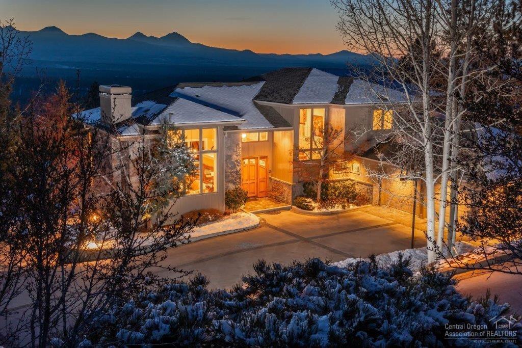 Rare & unobstructed, 8 peak Cascade Mtn Views from this stunning custom home with serpentine heated driveway. Built by the current owners to capture views from most of the living areas as well as 1422 sq ft of paver deck. Well maintained & quality built with level entry & main level living that includes the great room, an oversized master suite, custom office lined with Cherry wood cabinets & a view flex space. The open great room has a stone fireplace, spacious dining area, high ceilings & well placed wood wrapped windows to capture breathtaking views & fill the home with warm natural light. New Acacia wood flrs throughout the great room. Gourmet kitchen has a wall of windows facing the peaks creating an incredible space for cooking or entertaining while watching the Cascades change color. Huge Granite Center Island, breakfast bar, custom cabinetry & new Miele Range. Downstairs additional storage & Bonus rm with built-in Murphy bed, full bath, wet bar & 3rd garage bay access.