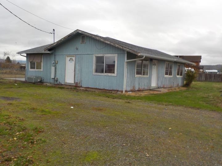 Fixer upper opportunity here. Great piece of property in a wonderful location near Crater Lake hwy and the Rogue Valley Airport that is all level and has a huge detached garage/ shop. Needs some repair but the bones are so good and it is so much here for the price.