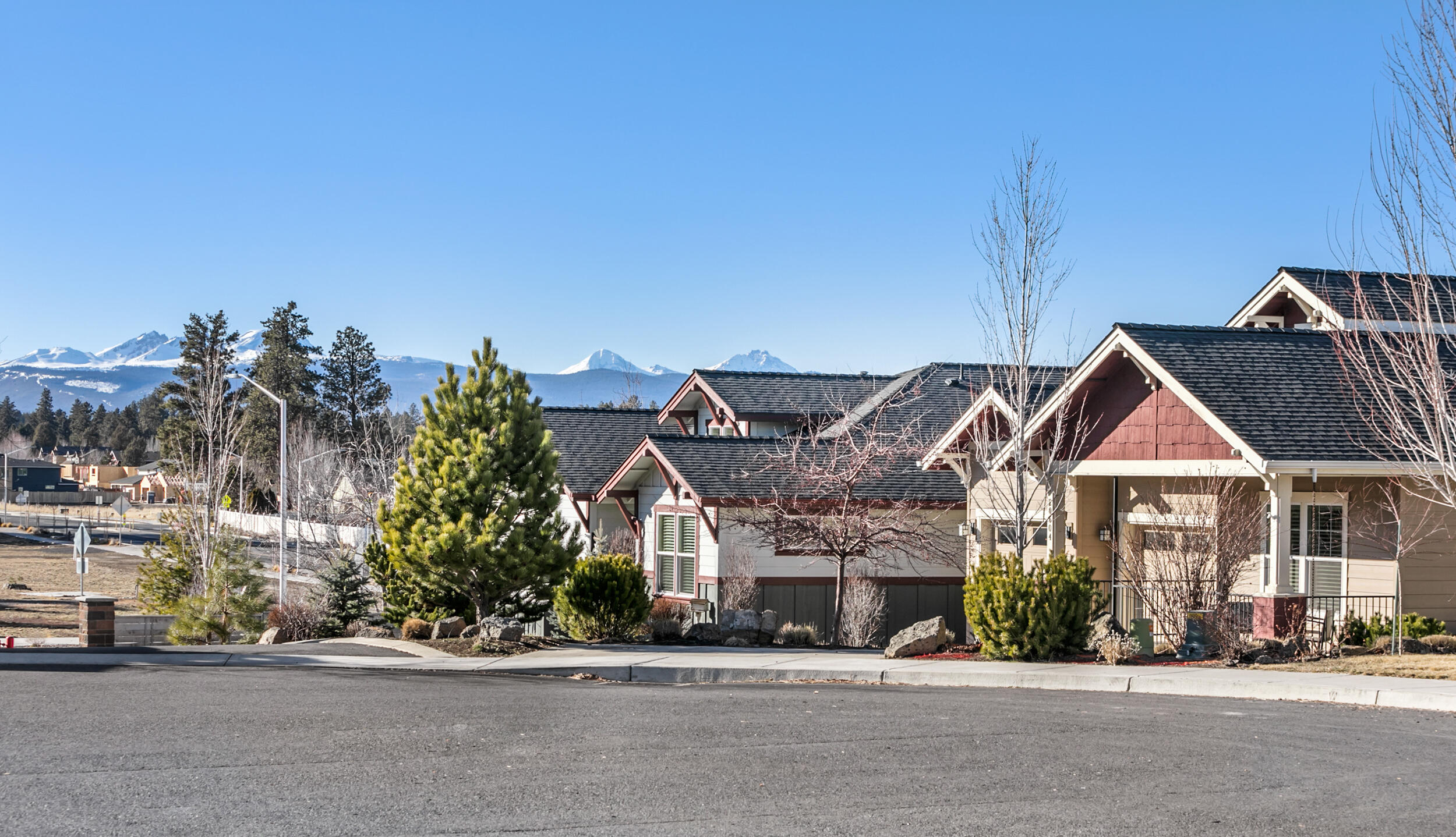 Situated in the desirable Hidden Hills community in SE Bend. Quality built to Earth Advantage Certification standards (healthier & energy efficient). Single level, low maintenance living in beautiful surroundings. Covered front paver patio greets you, perfect for morning coffee. Entry has tall ceilings and entrance to the front bedroom/office with privacy and separation. Elevated ceilings continue in the open concept living space, cozy yet spacious enough for entertaining. Fully equipped kitchen with breakfast bar, stainless steel appliances & pantry, looks onto dining and living room w/ gas fireplace and built-ins. Primary suite has walk-in closet, spacious bathroom with walk-in tiled shower & dual vanities. Nicely sized 3rd bedroom and additional full bathroom. Laundry room w/cabinets leads to the large 2 car garage. Patio spaces off of the dining and living room. Community bridge access to the new 37 acre park due to be completed spring/summer 2022.