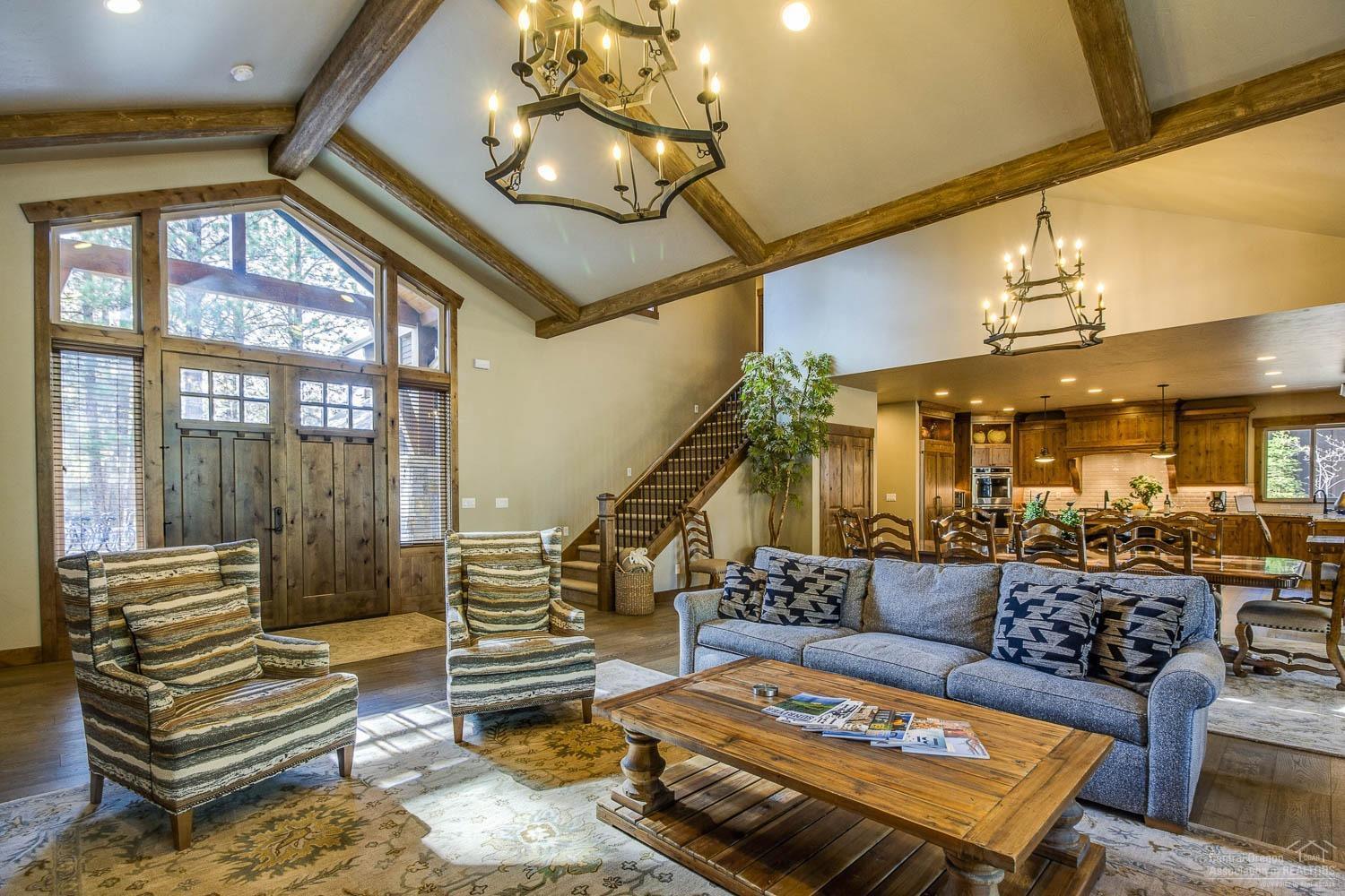 Investors welcome to a dream come true-there is still $103K in rents coming for 2020 (as of 6/18/20) Come, stay, relax and reconnect with your closest friends and family in unparalleled style. Gather in the great room with high vaulted ceilings and expansive stone fireplace while looking out to the tall pines. Gourmet kitchen equipped with a 6 burner gas range, 2 ovens, microwave and clean it all up with 2 dishwashers. 6 well appointed master suites each creating its own relaxing atmosphere. One SUPER SIZED bunk suite with TV, gaming area and 8 beds! Out door living area that is unmatched! You will have to see this one to believe it! Come and play on the miles and miles of trails, community events and gatherings and Zeppa Bistro (open May-Spet) at the Lake House, workout and pool facility at The Quarry, golf, tennis, lakes and parks all encompassed w/in Caldera Springs. Come be pampered in luxury and live the life you were meant to live! Impressive VRBO rental. 2019 was approx $135K.