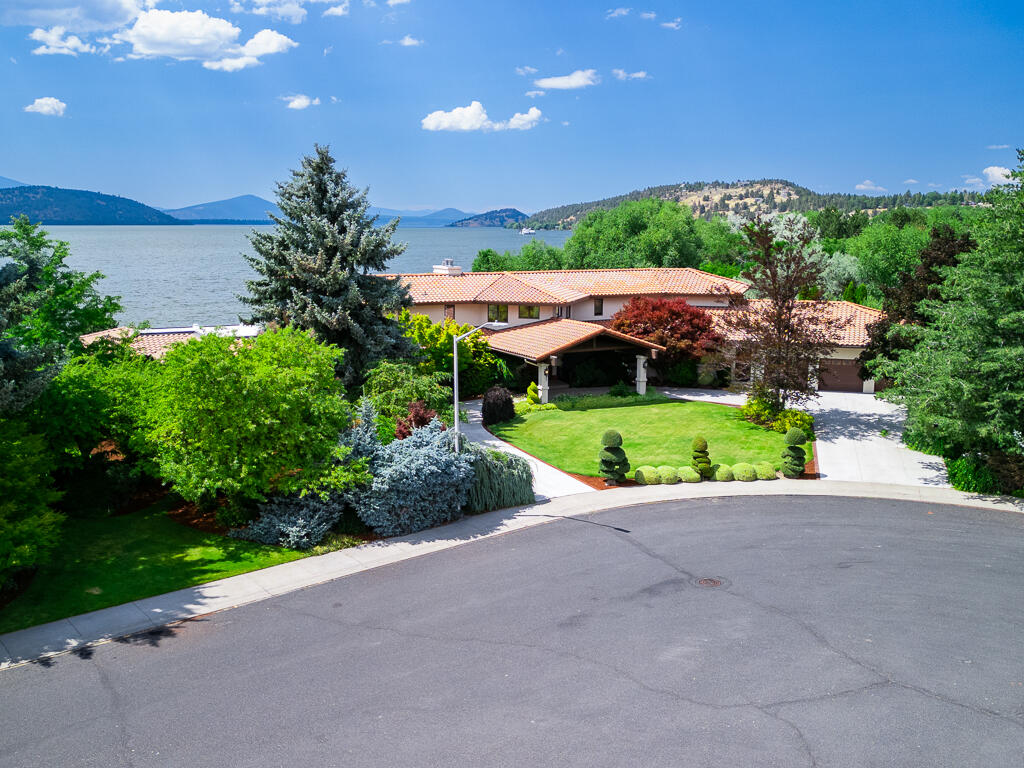 Welcome to 3130 Front Street, a stunning lakeside retreat nestled in the picturesque surroundings of Klamath Falls, Oregon. This magnificent estate boasts an expansive 7,155 square feet of luxurious living space, offering unparalleled comfort and elegance. As you step inside, you are greeted by an atmosphere of grandeur and sophistication. The spacious layout encompasses five bedrooms and five bathrooms. Situated on the shores of Klamath Lake, this property offers a serene oasis for those seeking tranquility and natural beauty. Two primary suites, one downstairs and one upstairs. Car enthusiasts will appreciate the impressive 6-car garage, perfect for storage and customization. Set on 1.15 acres of lush land, this property offers privacy while being conveniently close to local amenities, hospital, shopping and OIT. The seller to provide $15,000 in lender closing costs to include point buy downs and loan costs with an acceptable offer.