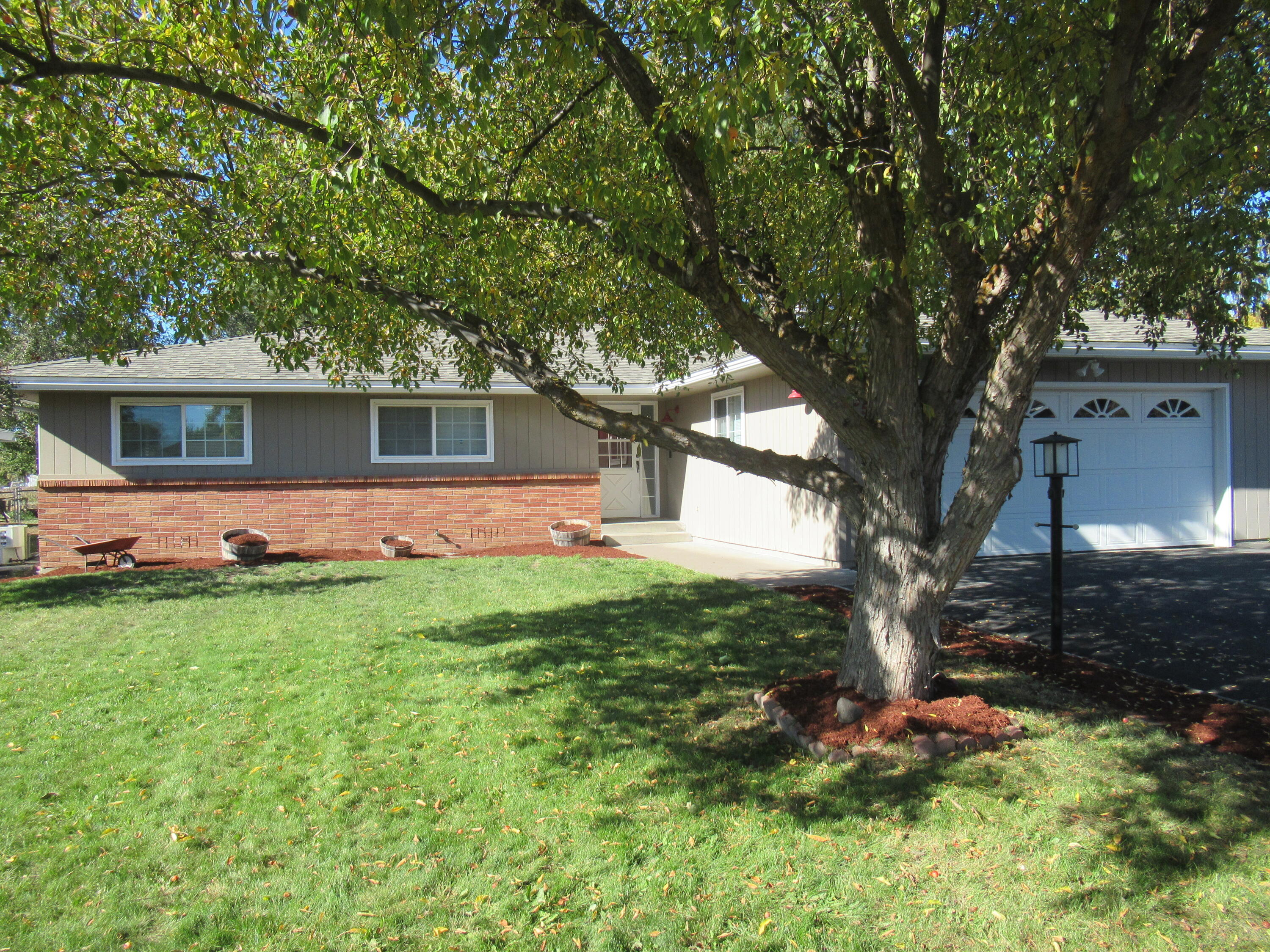 Welcome to this wonderful home in the desirable South Suburbs! This spacious 3-bedroom, 2-bath residence offers both comfort and functionality, featuring a front living room with a lg. skylight for extra natural lighting, central A/C, a family room with the warmth of a gas fireplace, and a separate study or den with beautiful built-ins. The open dining area seamlessly flows into a well-appointed kitchen featuring high-end James Borror cabinetry, a breakfast bar, and a spacious walk-in chef's pantry. The primary suite includes a jetted tile tub/shower combo, a standard closet, plus a huge walk-in closet that conveniently connects to the functional & spacious laundry room with backyard access. Enjoy outdoor living on your covered deck and patio overlooking the fenced, landscaped yard that offers a nice, fresh country vibe, along with room for RV or Boat parking.
 This home is polished and move-in ready!