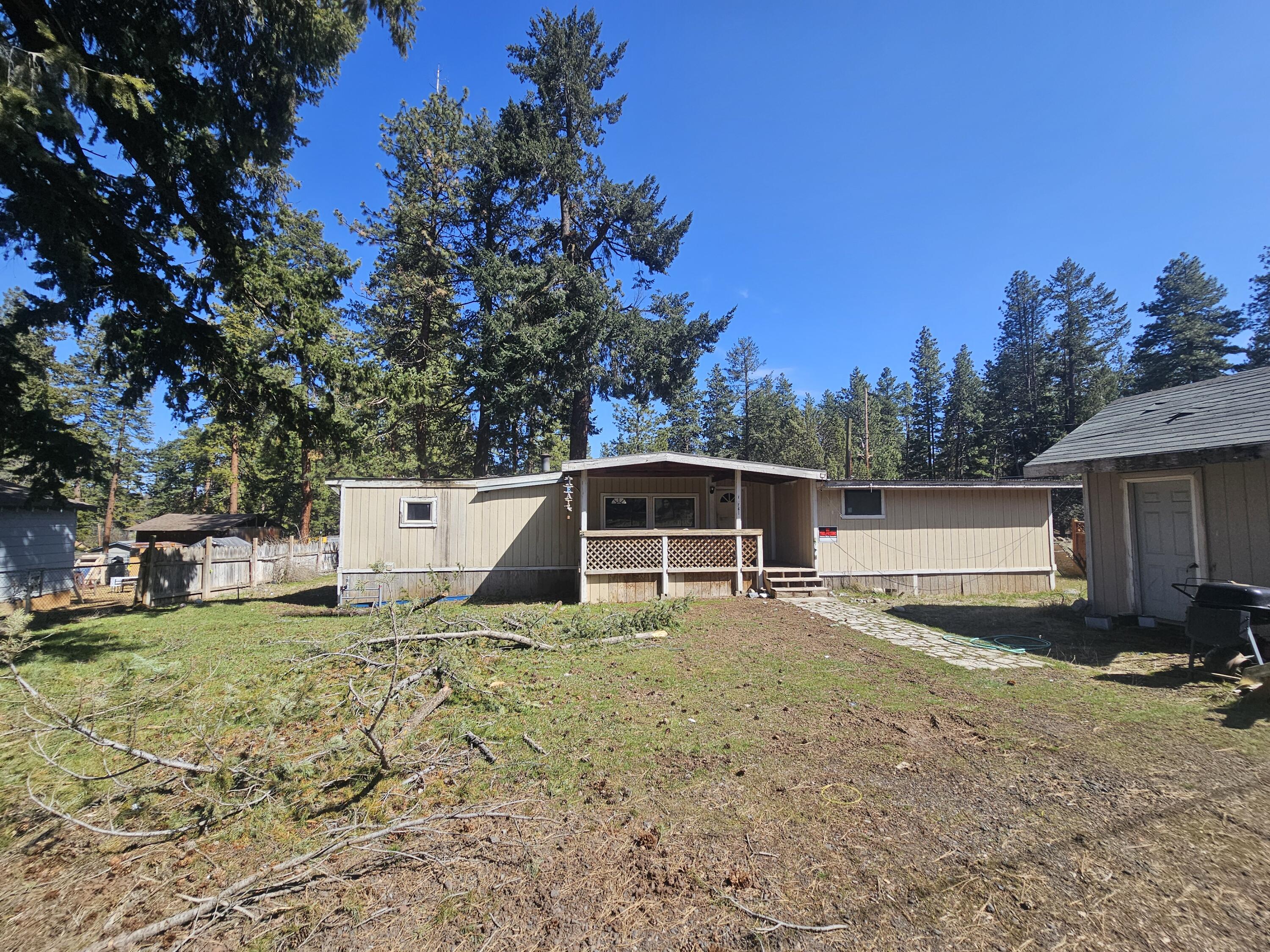 Spacious 1-Acre Property with Shop & Fixer-Upper in Desirable Keno! 3 Tax lots!
Endless potential awaits on this 1-acre property, featuring a large shop/garage with a carport, and a manufactured home in need of TLC. 
Previously home to two manufactured units, this property offers exciting possibilities - whether as a multi-family residence, an investment opportunity, or a fresh start for the right visionary. With two septic systems and existing electric onsite, much of the groundwork is already in place! The seller had talked with the county at one time about putting 3 homes on the property! Located in a sought-after neighborhood and within the Henley Middle and High School districts, this is a rare chance to create something special. Don't miss out on this opportunity! The existing home might be salvageable but might need to be torn down. It is up to buyer to do their own due diligence on the condition of the existing home and property.