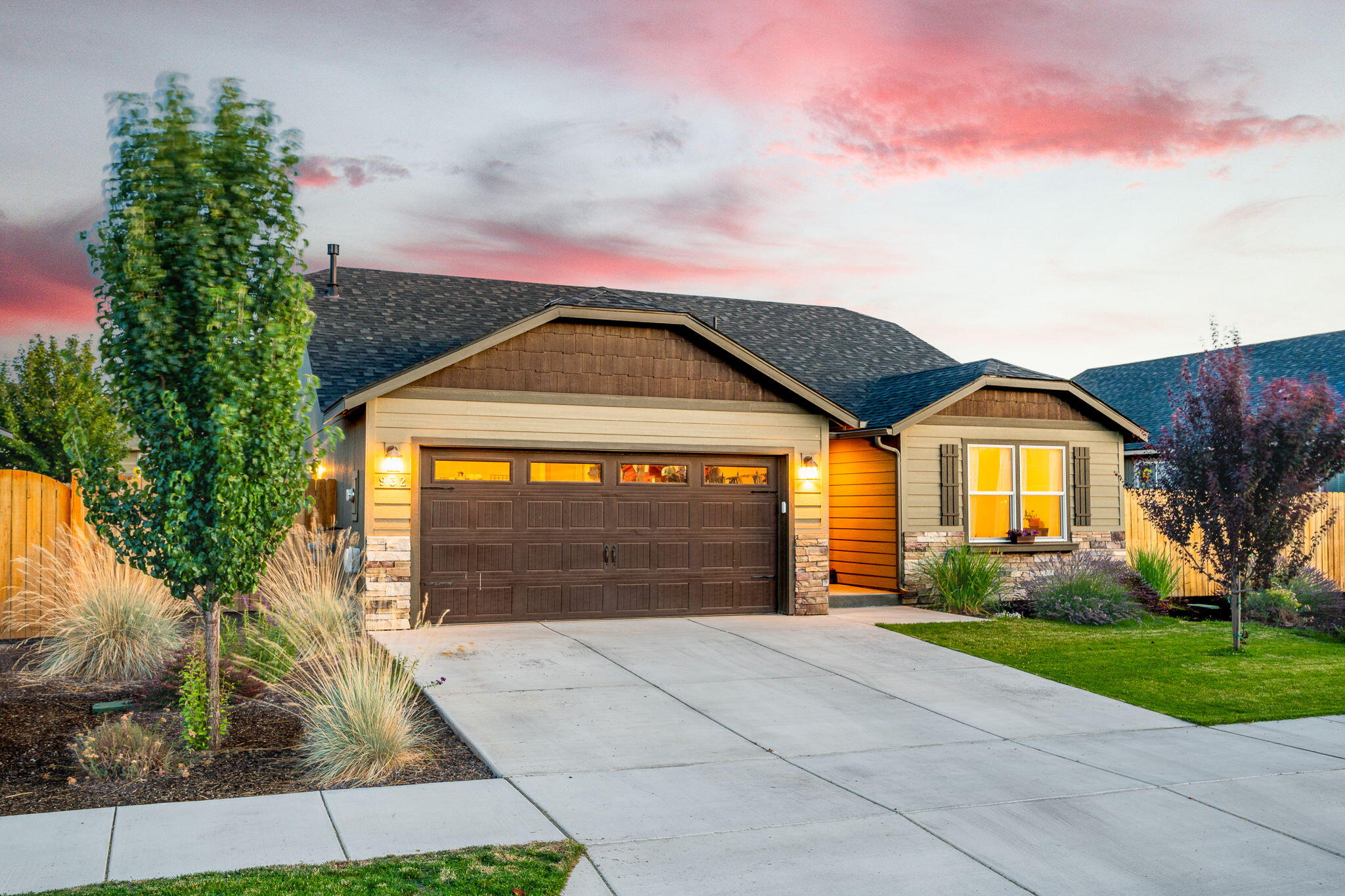 Charming 3-bed, 2-bath single-level home in a quaint cul-de-sac! This 1,408 sq ft layout welcomes you with a wide entry and open-concept design. The kitchen features quartz counters, soft-close cabinets, full tile backsplash, and a large island perfect for entertaining. Vaulted ceilings, luxury vinyl plank flooring, and a cozy gas fireplace add warmth and style. The spacious primary suite includes dual vanities, a walk-in shower, and a two generous walk-in closets. Enjoy a fully fenced backyard with a patio and mature landscaping, with a menagerie of herbs and veggies. The spacious 2-car garage features a 4-foot garage extension and epoxy floor. Located near Tom McCall Elementary, Hwy 97, and local shopping.